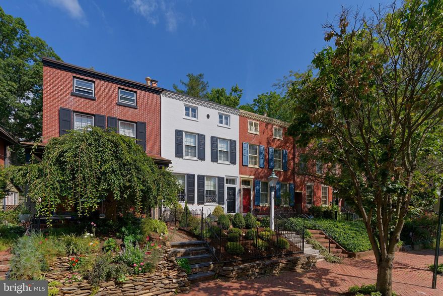 **Open House Canceled** Prepare to be wowed by this immaculate Boro rowhome! Situated just 1 block from the library and a couple of blocks from Marshall Square Park, you’ll be able to walk to all your favorite Boro hotspots and return home along brick sidewalks to the most inviting front yard. 13 W Biddle St offers picture perfect curb appeal, a private fenced backyard, and a stylishly designed floorplan that’s jam packed with character. With hardwood floors, an exposed wood beam, 1 wood burning fireplace and 1 gas fireplace, and built-in storage at nearly every turn, this home blends sophisticated style with practical living spaces. There’s a spacious front living room, dedicated dining, 1st floor powder room, and a stunning kitchen with adjacent breakfast nook – so charming with modern design and a touch of vintage flair. Upstairs, there are 2 bedrooms and a full bathroom plus a lovely bonus room that adds so much versatility. Set up this space as a sitting room, library, or dedicated home office, and it can even be used as a semi-private guest room. The third floor boasts another bedroom and another full bathroom, and the theme of built-in storage and natural light continues. Plus, 13 W Biddle St also offers an unfinished basement that provides plenty of extra storage space. The backyard will become your personal oasis, completely fenced and offering a low-maintenance space to enjoy al fresco dining, with “wall to wall” brick pavers (no lawn to mow!) and a raised garden bed. What a stunning, stylish home in the heart of it all! The West Chester Boro lifestyle is at your fingertips. Request a personal tour today!