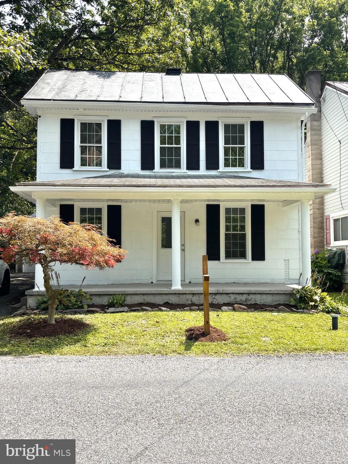 This nicely updated 2-bedroom, 2-bath home offers comfortable, easy living with a view of the creek just across the street. Recent upgrades include vinyl flooring throughout, a pellet stove, first-floor laundry, and a newly added bathroom. The kitchen is equipped with new appliances, and everything is ready for you to move right in.
There’s a detached one-car garage for storage and off-street parking, plus a front porch where you can relax and enjoy the sounds of the creek. The property was also recently removed from the flood zone for added peace of mind.
Whether you're starting out, downsizing, or just looking for something simple and solid—this home is worth the look!