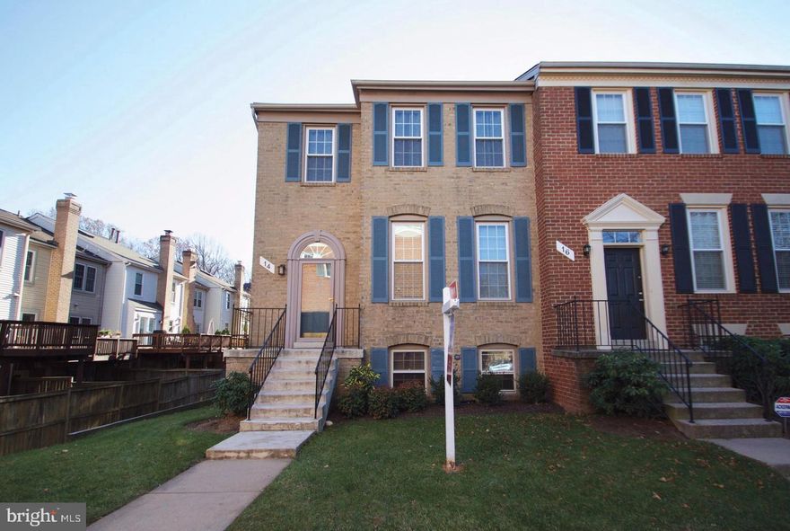 This fabulous end unit town home is located in the sought after Walter Johnson school district.  The spacious, sun-filled interior boasts nearly 2300 square feet of living space across 3 levels. Features include an eat-in kitchen with granite counters, breakfast bar, standard appliances, built-in microwave; family room off the kitchen with sliding glass doors that lead to an expansive deck. Elegant living and dining room spaces; hardwood floors throughout the main floor; and powder room. The upper level boasts a GRAND master bedroom with vaulted ceilings, sitting area, en-suite master bath with double vanities, Jacuzzi, separate shower & walk-in closet; and 2 additional generously sized bedrooms. Ceiling fans are installed in all bedrooms for added comfort. The lower level features a finished, walkout basement with family room, wood-burning fireplace with mantle, laundry/storage room; and covered patio. This home comes complete with a fenced-in backyard, and 1-assigned parking spot. Conveniently located off Old Gerorgetown Rd, within 0.4 miles of a Ride-On bus stop; 0.5 miles to Timberlawn Local Park, 0.2 miles to Norman's Farmer's Market; 1- mile to Whole Foods Market, 1.7 miles to  White Flint Metro Station for access to DC;  and within minutes of the beltway (I-495) & I-270. This home won't last long, submit your application today.