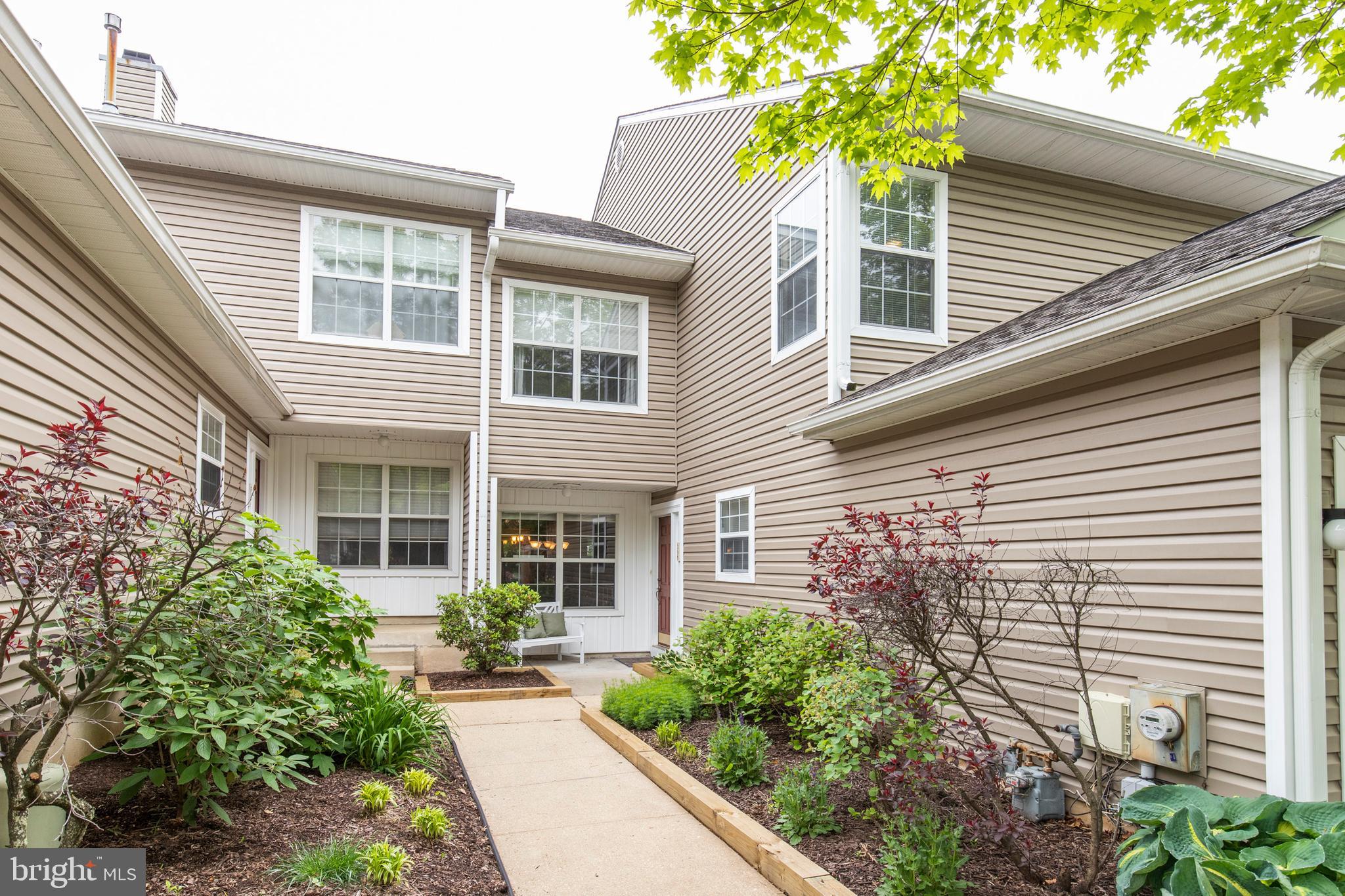 A MUST SEE this Beautiful, COMPLETELY updated Townhouse at 308 Stanton Court, Darlington Woods in Glen Mills! From the moment you arrive you will fall in love with everything about it.  You'll be welcomed by the cozy front patio. Then, as you enter, you'll notice the hardwood floors throughout the home, the lovely open Living Room and Dining Area with lots of windows and a charming deck looking out to a wooded backyard. The Living Room also boasts a wood-burning Fireplace (never used by this owner) that can easily be converted to gas. The Kitchen is stunning: TOTALLY updated, sunny and bright with granite counter tops, glass & porcelain mosaic back splash, a cozy eating area looking out to the front patio, and all decorated in soft shades of gray.  The first floor is complete with a convenient Laundry Room and an updated half bath. The Hardwood Floors continue on the second floor, which has  3 large bedrooms, an updated hall bath and includes a spacious Master Suite. The suite has a walk-in closet, and a lovely Master Bath with a shower as well as a Jacuzzi tub.  In the open upstairs hallway, you will notice a square nook by the staircase. This was designed to allow for the installation of an ELEVATOR, if the need or desire to have one ever arises. And NOW to the Finished Walkout Basement! This HUGE open area includes large windows, and access to the patio and lovely shaded backyard via the sliding glass door.  It also has two extra rooms with LOTS of Storage and built-in shelving. The seller has paid special attention to every detail of the home and last summer (2018) installed a NEW HVAC system! With an acceptable offer the seller will include an America's Preferred Home Warranty for the buyer for one full year.  Darlington Woods is a wonderful community providing Tennis Courts, a playground, as well as a community center, fitness facility and a beautiful pool.  Located close to major routes, wonderful shopping and dining, easy access to Media, AND in the highly rated GARNET VALLEY SCHOOLS . . . who could ask for anything more!  Make your appointment to visit TODAY!