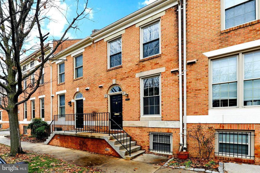Discover modern living in this chic and upgraded three-bedroom, two-full-bath, one-half-bath townhome with parking, located in the sought-after community of Canton Square. The main level boasts gleaming hardwood floors and showcases an updated kitchen with stainless steel appliances and premium countertops.  The living room features a fireplace and sliders to a spacious deck with park views.  The second floor boasts two bedrooms with vaulted ceilings, creating an airy and expansive atmosphere.  The third bedroom, full bath, and laundry are found in the brightly finished lower level.  This residence is ideally located, offering easy access to waterfront activities, shopping destinations, major highways, and all the vibrant amenities that Canton has to offer. Embrace a lifestyle of comfort and convenience in this stylish townhome.