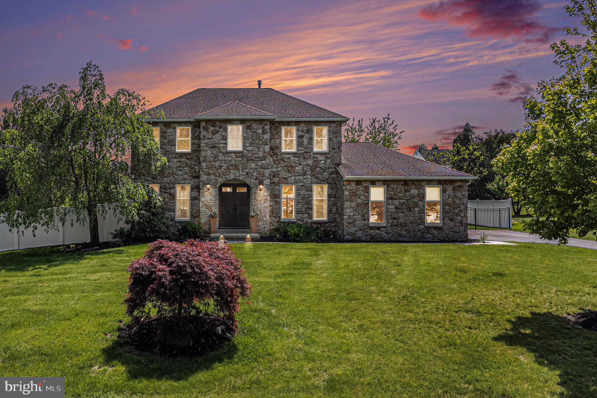 Welcome to this beautifully maintained 4-bedroom, 2.5-bath colonial offering over 3,200 square feet of finished living space on a private half-acre lot in the desirable Gwynmont Farms community. Nestled on a quiet, tree-lined cul-de-sac, this home delivers the perfect combination of space, comfort, privacy, and an unbeatable location.
Step inside to a bright, open foyer with a welcoming staircase and landing that create a warm and airy introduction to the home. The main level features a formal dining room, a spacious living room, and a private office with private access—ideal for today’s flexible living needs. Photos uploaded 5/13
The heart of the home is the beautifully updated kitchen, featuring an L-shaped island perfect for entertaining, cherry cabinetry, granite countertops, and ample storage. The kitchen opens to the sunken family room, where vaulted ceilings, skylights, and a new gas fireplace insert (2015) create the perfect cozy and bright gathering space. South-facing windows and strand bamboo flooring bring warmth and an eco-conscious style to the main level.
Step outside to your private backyard retreat—featuring a covered porch, hot tub, new deck, and a custom in-ground concrete pool (installed in 2014). Surrounded by vinyl privacy fencing and a well-maintained lawn, the outdoor space is ideal for entertaining.
Upstairs, the primary suite includes a walk-in closet with built-in shelving, a dressing room area, and a spacious ensuite bath with a soaking tub and stunning tilework. One adjacent bedroom connects directly to the primary, perfect for a nursery, sitting area, walk-in closet, or private office. A renovated hall bath serves the additional bedrooms with updated finishes and tile.
Find additional living space in the finished basement, adding 744 sqft of versatile space. It includes a laundry area, utility room, and space for a home gym, media room, or additional family area. A second laundry hookup is also available in the mudroom, just off the two-car garage, which includes built-in cabinetry and storage. The mudroom has the original washer/dryer hook-up that can be easily accessed.
Enjoy nature just steps from your door with the 202 Parkway Trail, perfect for walking, biking, and jogging. Windlestrae Park offers over 100 acres of open space, trails, a dog park, and sports fields. For outdoor adventures, Peace Valley Park & Lake Galena is only 15 minutes away, and Lake Nockamixon State Park is just 25 minutes away for boating, hiking, and fishing. Explore the charm of Doylestown Borough, only 20 minutes away, with boutique shopping, dining, and local events. Just minutes from shopping, dining, and immediate access to Route 202, Route 309, and the PA Turnpike (476). This home truly checks every box—updated systems, generous space, outdoor luxury, and a prime location. Schedule your private showing today!