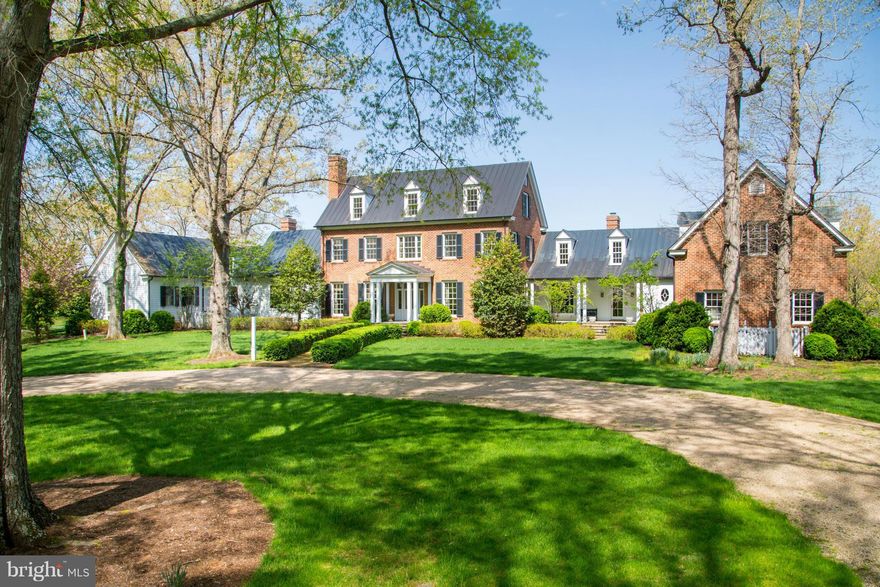 Incredible country estate west of Charlottesville with spectacular custom brick manor; heart pine floors, first floor master wing with covered terrace overlooking rolling hills of this property. Meticulously maintained residence w/ high ceilings and the finest of materials throughout. Amenities include a beautiful heated in-ground pool & pool house, and tennis court. Panoramic views of the Blue Ri