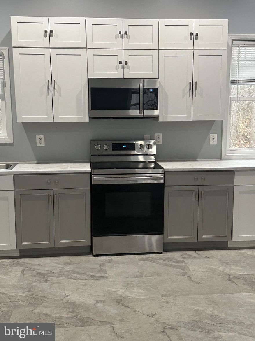 This 2 year young apartment sits on private 14+ acres.  The apartment is above the detached garage of the owners home.  Open concept, 10 ft ceilings, the two bedrooms are on opposite sides of the apartment.  The owners built the garage and lived above the garage for 2 years while building their home.