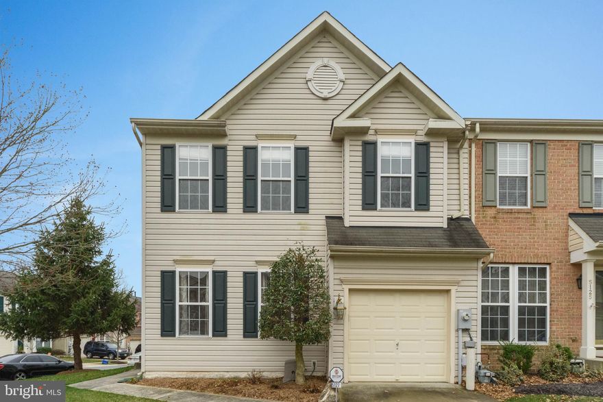 Located in New Town this end of group   3- bedroom , 2- full bathroom and 2- half bathroom town house  features a kitchen with stainless steel appliances,  half bathroom, an island, granite counter tops and laundry room.   A bright sunny morning room off the kitchen .  A finished one car garage with Rust Oleum floor and electric garage door opener with 2 remotes.   Formal dinning room, living room with hard wood floors.  The upper level is carpeted with  a master bedroom,   a relaxing master bathroom with jetted tub ,  upgraded shower stall and walk in closet.   Hugh basement family room has a gas fireplace ,  half bathroom and unfinished storage area.    All window treatments convey with the house.  Newly installed 10 year smoke detectors.  Manicured lawn with 4 adult trees.  Upgraded HVAC system.    "Like new" this house shows very well.   It your new  home, don't miss this one.