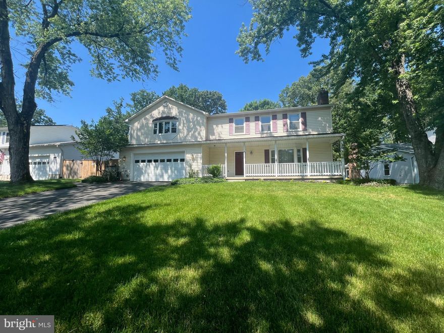 Welcome to your dream home in Severn, Maryland! This stunning 5-bedroom, 4.5-bathroom residence offers spacious living with hardwood floors throughout. The expansive primary suite features two walk-in closets, an ensuite bathroom with a walk-in shower, double vanity, and a private deck. The upper level hosts five spacious bedrooms with ample closet space, while the basement includes a partially finished area with a bedroom, full bath, and kitchenette—perfect for guests or an in-law suite. This home boasts a sunroom and a large utility room, providing additional versatile space. The large laundry room, conveniently equipped with a laundry chute off the garage, ensures ease of living. Outdoor living is a delight with a pergola over the large backyard deck, surrounded by beautiful flower gardens and a charming stone fire pit. Storage is plentiful, ensuring you have space for everything. The home also includes a 2-car garage for your convenience. Located close to Route 100 and Arundel Mills, you'll have easy access to shopping, dining, and entertainment. Don't miss out on this exceptional property!