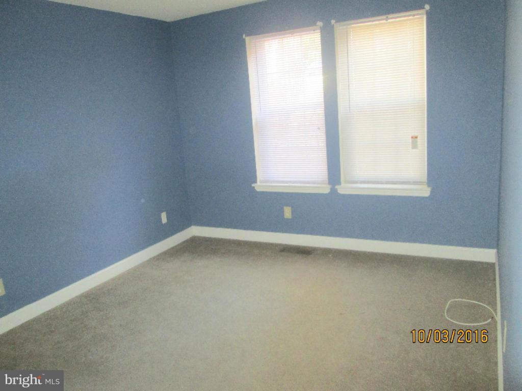 Adorable, well-maintained 2 level bottom townhome with custom blinds and fixtures. Ceramic tile in kitchen, bathrooms, and foyer. Double French doors open to lawn and scenic, wooded area. Located in a quiet gated community. Amenities in the community include a pool, baby pool, and playground. Great location--very close to Glenmont Metro, bus service, shopping ,restaurants and all major routes.