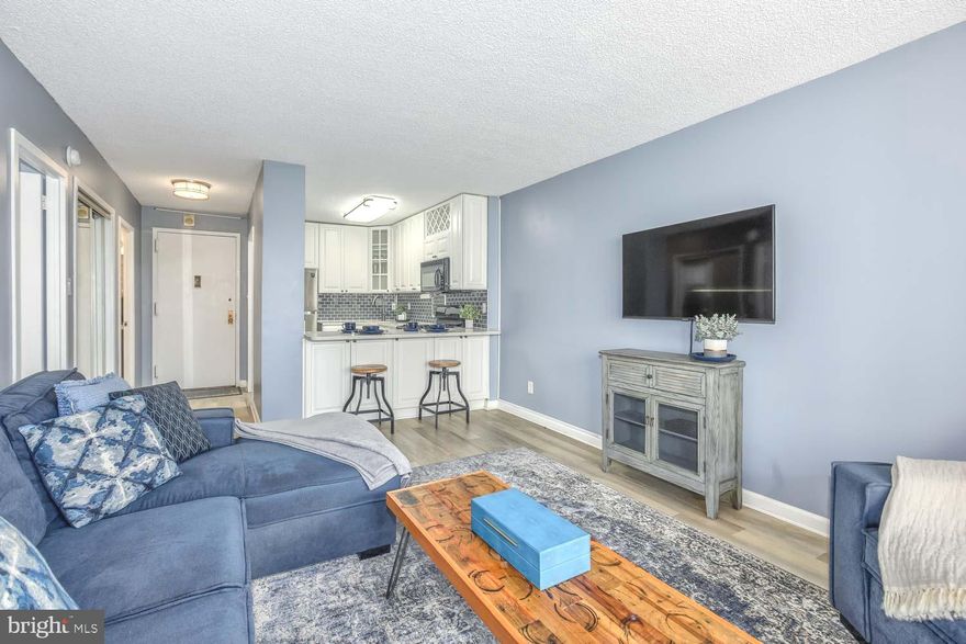 ***1st Open House 10/1 - Wine on Wednesday 4-6pm***. RESORT LIVING at it's very best!   Newly renovated and FULLY FURNISHED, enjoy the country club ambiance with this  newly renovated lobby, concierge service and cozy lounge seating throughout the elegant halls of this landmark building in Bethesda.    Indoor/Outdoor pool, billiard room, library, hair salon, Chef Tony's Restaurant, market, sunning decks, in-house SPA and so much more!   Enter the South Wing with artistic lighting and museum style art halls.  Enter your private oasis and enjoy a tree line view off the deep balcony.   Large living room, open kitchen with bar seating and stainless steel appliances.   Spacious bedroom with large windows and walk in closet to the modern bath with floor to ceiling tiled shower.   All this with utilities included, bus service to Metro, grill stations, gorgeous grounds and gated for your safety!