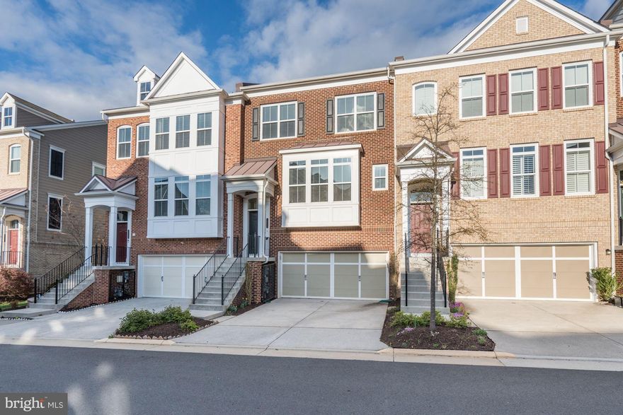 BRICK FRONT MOVE-IN READY TH 1-BLOCK TO METRO, 1-STOP TO MOSAIC DISTRICT, MINUTES TO DOWNTOWN* 3BR/3.5BA W/ 2-CAR GARAGE & FEATURES SPACIOUS OPEN KITCHEN W GRANITE, SS, ISLAND, DBL OVEN, XTRA STORAGE, HARDWOODS ON MAIN & UPPER HALL * DECK OFF KITCH * SERENE MBR W WIC, MBA W SEP SHRW, SOAKER TUB, DUAL VANITY - BR LVL LAUNDRY - LL REC RM TO PATIO FIY & MORE  *NEAR SHOPS, RESTAURANTS - OAKTON SD !!