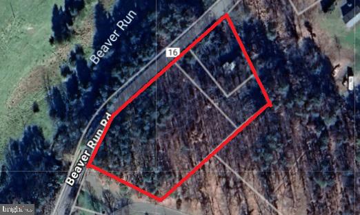 UNRESTRICTED---NEED I SAY MORE?! Nestled in the heart of Wild and Wonderful West Virginia rests this lovely wooded, level, and accessible building lot. Perc test approved and public water available!!!