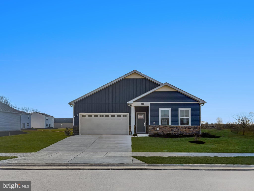 Photo of 26286 Ocean Isle Drive, MILLSBORO, DE 19966 (MLS # DESU2119028)