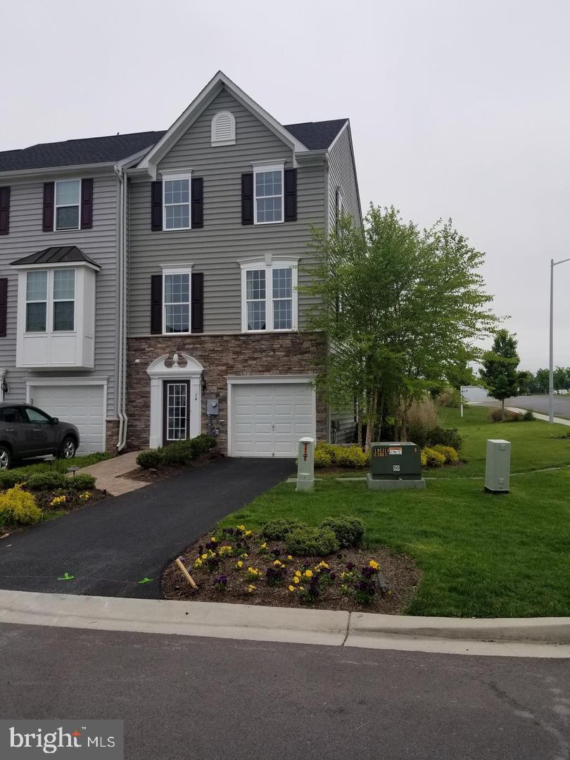 AVAILABLE IMMEDIATELY!! Spacious Townhouse in the Spring Mills/Falling Waters area with mature landscaping, lighting, a 10 X 18 pressure treated deck and stone water table situated on a corner lot. Plenty of overflow parking for entertaining. Finished lower level for recreation room, office or 4th bedroom options. Fully furnished appliance package with washer and dryer. Kitchen island, pendant and recessed lighting along with upgraded cabinets. Upgraded and ready for you. NO INDOOR OR OUTDOOR SMOKING! PETS ON CASE BY CASE BASIS! $500 NONREFUNDABLE DEPOSIT FOR EACH PET! Must have renters insurance. One application required with $40.00 application/processing fee and credit check for each adult 18 or older living in the unit. Ask for the application link.