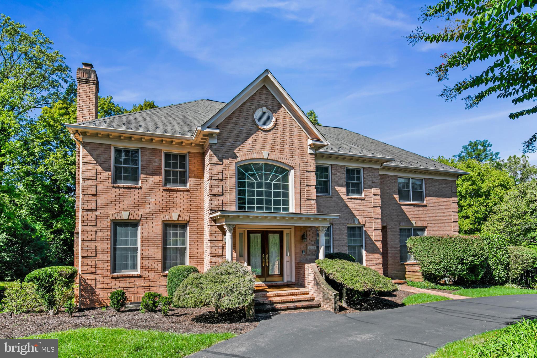 Exceptional timeless colonial in one of McLean’s most desirable neighborhoods. This 6-bedroom, 5.5-bathroom home, spanning over 6,300 square feet, blends luxury and practicality seamlessly. As the builder’s model home, it showcases exquisite upgrades and sophisticated touches found only in the finest residences. At the heart of the home is the gourmet kitchen, a chef’s dream featuring a large center island, updated appliances including a warming oven and oversized refrigerator, and a bright breakfast room that opens onto a back deck overlooking the meticulously landscaped yard. Adjacent to the kitchen is the inviting family room, complete with a timeless stone fireplace—perfect for cozy evenings or lively gatherings. For added convenience, the main level includes a library/office, a formal living and dining room with a classic butler’s pantry, and a guest suite with a private bath, ideal for visitors or as an additional workspace. On the upper level, retreat to the opulent owner’s suite, boasting a private balcony, wet bar, dual walk-in closets, and a spa-inspired bathroom with a steam shower, double vanities, and a separate water closet. Three additional spacious bedrooms and two bathrooms complete this level. The lower level offers endless possibilities, including a bonus second kitchen with a breakfast room, a large recreation room, and an additional bedroom with a full bath—ideal for guests, in-laws, or extended family. This home is packed with luxurious features, including new lighting, custom built-ins, four fireplaces, oversized windows, fresh paint, new carpet, and countless other upgrades. Completing this timeless gem is an oversized three-car garage and a beautifully landscaped yard, offering exceptional privacy. Nestled on a quiet cul-de-sac in one of McLean's most sought-after neighborhoods, this home is located within the prestigious Langley Pyramid School District. A commuter’s dream, it offers easy access to the Beltway, Metro, Washington, D.C., and Tysons, all while being less than two miles from the heart of McLean. This exquisite property is where luxury, comfort, and convenience come together to create the ultimate dream home.