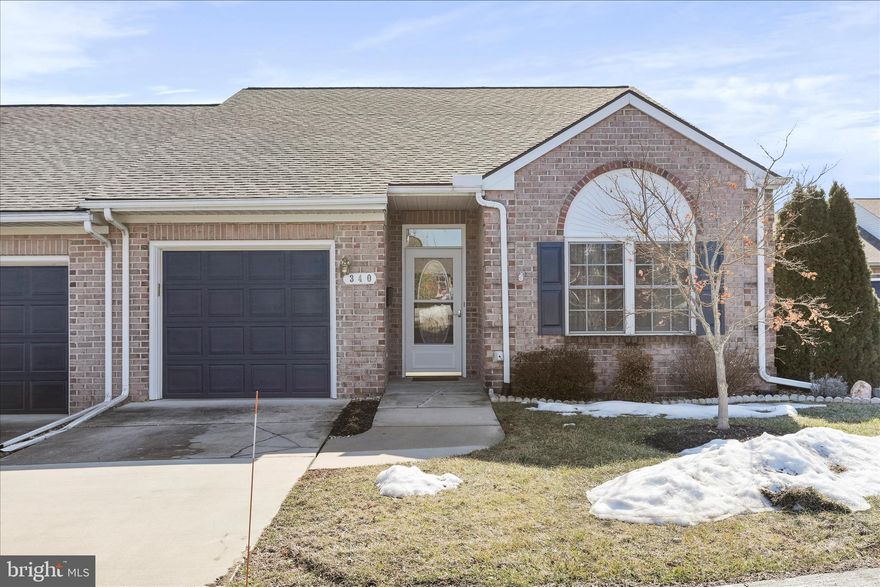 Welcome to our newest listing here at Summerland Manor! This end-unit home offers 1-level living, with 2 bedrooms and 2 full baths. This "Hemingway" model has 9' ceilings, and a lovely sunroom for your enjoyment. Hardwood flooring, as well as newer beautiful luxury vinyl in the foyer, living room, and kitchen.and second bedroom.  This nice and bright, fully-equipped kitchen offers upgraded quartz countertops with a pretty backsplash too! Newer roof within the last few years, and new blown-in insulation with R-50 value for an added energy saving feature. If you're looking to get away from exterior maintenance, this gated community may be the place for you. Don't wait to schedule your showing and contact us today!