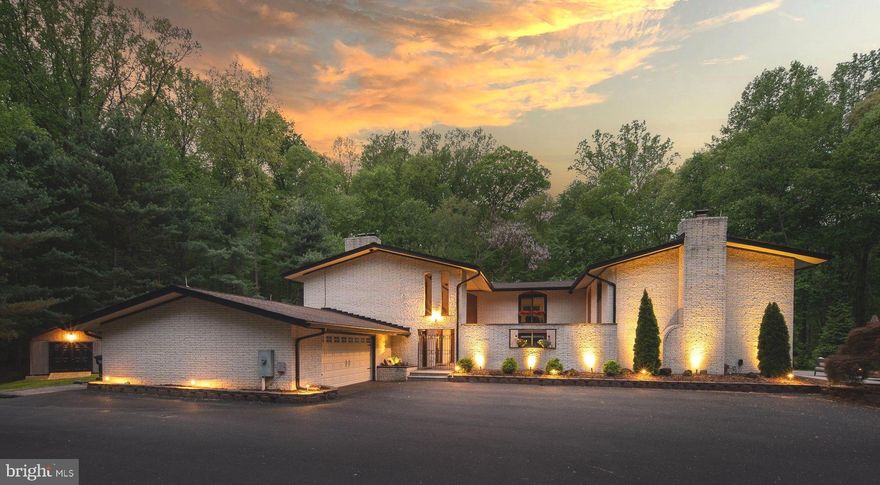 There are homes that are beautiful to look at, and then there are homes that change
how you live. This rare estate set on five tranquil acres within a quiet, established
equestrian community,  belongs firmly to the second category. This home has been lovingly cared for and maintained by the same family since 1996.  Homes in this neighborhood rarely become available. 

Nestled on a cul de sac in an equestrian neighborhood with bridle trails, this striking
five-acre estate offers a rare blend of privacy, architectural character, and serene natural
surroundings. The home’s exterior made of split rock and the low-pitched roofline create a
timeless aesthetic. This residence unfolds across a distinctive U-shaped footprint,  a
design that draws the landscape inward through a stunning central courtyard that is
accessible from every wing of the home. This is a home that holds a gathering of
twenty as gracefully as a quiet evening for two.

The main level has been completely and thoughtfully renovated (2022), achieving a rare
balance between effortless entertaining and genuine, lived-in comfort. The showpiece
kitchen features quartz countertops, a large center island with bar seating, farmhouse
sink, professional-grade range, and custom cabinetry, all flowing naturally into casual
and formal gathering spaces. Exposed dark wood ceiling beams, dramatic red brick
fireplaces flanked with built-ins, and wide-plank floors lend the living areas a character
that no new construction can replicate.
Step outside and into your own private resort. The expansive 20 X 20 custom pavilion
is outfitted with an oversized floor-to-ceiling stone fireplace, mounted television,
recessed lighting and ceiling fan that creates and entertainers dream. It is worthy of any interior great room
yet provides an outdoor living room. The patio includes a 20 X 40 heated saltwater pool and spa newly built in 2023.
Landscape lighting was added to illuminate the grounds - This is the kind of backyard that
makes your guests forget to go home.
The upper level of the home is devoted entirely to private living, offering a primary suite  alongside five additional bedrooms, a large family gathering
room, and four full bathrooms — a layout that serves both privacy and togetherness.
One of the second floors most distinctive features is a large, dedicated family room that
expands the property's  functional versatility. Bright, open, and flooded with natural light
from surrounding windows, the room functions equally well as a media room, a
children's playroom, a home office suite, or a second living area for multi generational
arrangements.

This estate is located minutes from the town of Clifton, the VRE, shopping and all of the
major commuter routes, offering the perfect blend of privacy and convenience!
5 acres · 7 bedrooms · 6 bathrooms · 2-car garage · Pool and Hot tub · Pavilion with
outdoor fireplace · Fully renovated main level · Central Courtyard ·

More photo's will be uploaded this week! Stay tuned.