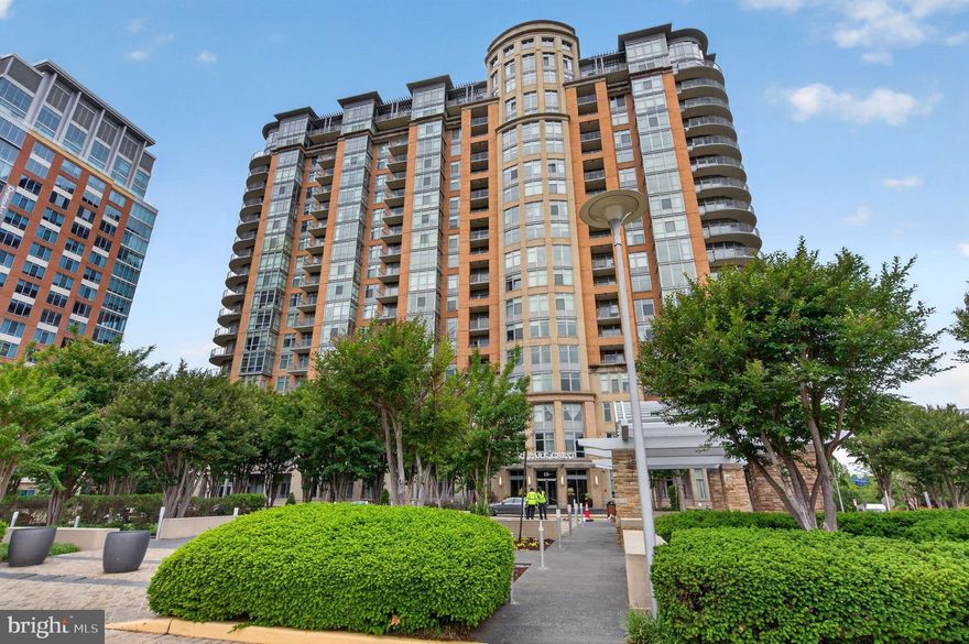 Experience Park Crest, Tysons desirable communities. This pristine residence offers 1-bedroom, 1.5 full baths, and a den convenient for in-home office, a wine room, or a room for your fury pets.  The expansive open-concept living and dining area creates an exceptional setting for entertaining, offering beautifully seamless interior space. Step into a private balcony  and take in the sweeping views. The owners bedroom offers a large walk-in wardrobe and an owners bath complete with a linen closet and a tucked away washer dryer room. The gourmet kitchen is equipped with stainless steel appliances and great wrap around counters great for cooking and entertaining. Residents enjoy a collection of luxury amenities, including a rooftop pool with long panoramic views, a fitness center with private yoga room. Enjoy a game of pool in the billiard room, sit by the fireplace with guests for happy hours, or host a social event in the large club house. Hospitality suites are also available for overnight guests and a meeting room available for conveniences.  24 hour concierge, ample guest parking, and a beautifully landscaped arrival courtyard are all part of the charm.  1 parking and 1 storage included.