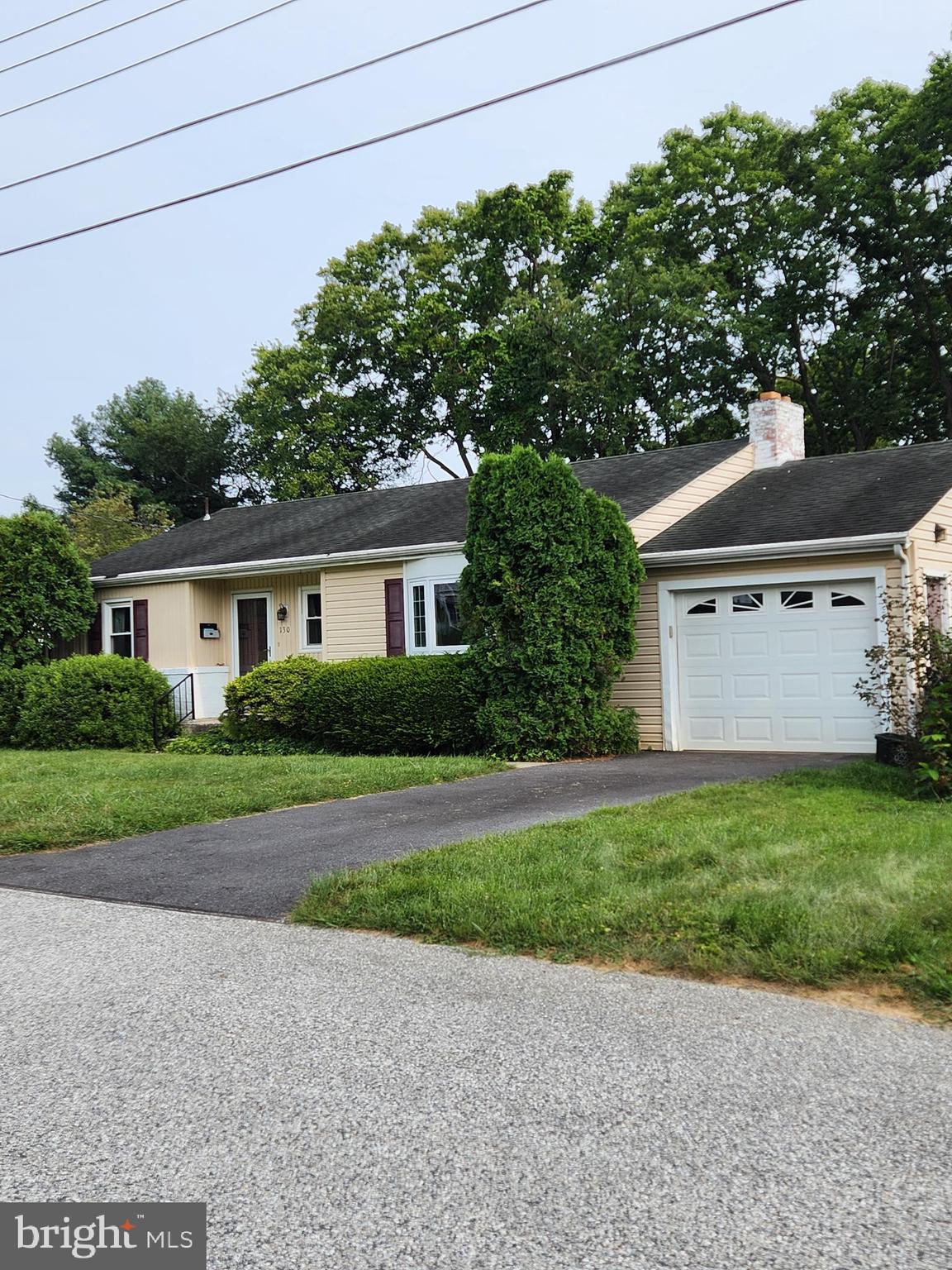 Welcome to this well-maintained one-owner brick and siding rancher, ideally situated on a quiet dead-end street in Hallam. This charming home offers convenient one-floor living with an attached one-car garage featuring a handicap-accessible ramp into the home. Inside, you'll find an updated eat-in kitchen with a skylight, replacement windows throughout, and a handicap-accessible shower. The home includes three bedrooms—one of which currently houses the laundry, but this could easily be relocated to the basement. Enjoy the warmth of a fireplace in the finished family room downstairs, along with ample storage space, including a dedicated room for canned goods. While the sunroom is unheated, it provides a peaceful view of the wooded backyard that slopes down to a serene creek—perfect for nature lovers seeking privacy and tranquility.