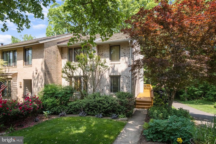 Discover a haven of outdoor living in this all-brick end unit townhouse, nestled on a peaceful, tree-lined cul-de-sac in desirable Reston.  This 3-bedroom, 2.5-bath residence boasts a stunning, light-filled main level showcasing beautiful hardwood floors. The open-concept kitchen, featuring quartz countertops and backsplash, is ideal for culinary creations and gatherings.  A generously sized deck, accessible from the kitchen/living area, overlooks a lot bordered by mature trees.  Upstairs, find spacious and bright bedrooms. The expansive lower level presents versatile options for a home office, den, or entertainment space, and opens to a large, private patio. Residents enjoy access to community amenities, including nature trails around the lake, the Ridge Heights pool, tot lots, and the South Lakes Village Center's shops and restaurants.  This commuter-friendly location offers proximity to the Toll Road, Wiehle Metro Station, and Dulles Airport. -------------------------------------------------------------------------------------------------------------------------------------------- All Richey Property Management residents must enroll in and purchase a Resident Benefits Package which includes liability insurance, credit building to help boost the resident’s credit score with timely rent payments, up to $1M Identity Theft Protection, HVAC air filter delivery (for applicable properties), move-in concierge service making utility connection and home service setup a breeze during your move-in, our best-in-class resident rewards program, and much more! More details and options provided upon application.