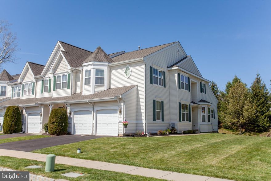 A rarely offered opportunity for a spacious end unit townhome in the very desirable Chalfont Greene community!  Enter through the inviting two story foyer and you will immediately appreciate the beautiful hardwood floors on the entire main level and the entire upper level as well.  The formal living room is on your left and is highlighted with beautiful wainscoting and crown molding.  The dining room, also accented with exceptional trim work, provides plenty of room for meals and gatherings.   The open flow from the dining room leads to the large family room highlighted by a gas fireplace with a cut out above and large windows letting in plenty of natural light.  The kitchen includes granite counters, gas cooking, stainless appliances, a vaulted ceiling and sliders to the back patio.  A beautifully updated powder room and a full laundry room complete the main level.  Upstairs you will find a large loft area suitable for an office area, a study or a play area.  The primary bedroom is accented with wainscoting and a tray ceiling, a walk in closet plus an additional double closet.  The primary bath includes a double vanity, frameless glass shower and a large Jacuzzi tub.  Two more bedrooms and a full hall bath complete the upper level.  The nicely finished basement with an egress window provides even more space for your living needs.  The large two car garage and double width driveway provide plenty of room for your cars.   Located directly across the street from the large park-like open area, this home will delight you both inside and out.  An added bonus is the brand new roof!  Central Bucks schools plus enjoy the convenience of the nearby Septa rail line.