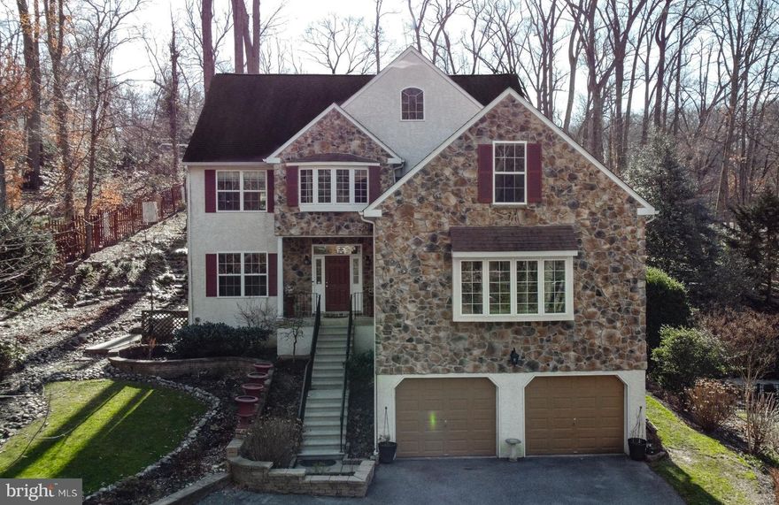 SPACIOUS and GRACIOUS! This modern traditional home offers an open floor plan with great flow for entertaining. This home has been lovingly maintained and upgraded by the owners inside and out. The GRAND FOYER ENTRY  leads to the very large GREAT ROOM  that serves both as a MUSIC ROOM and cozy LIVING ROOM with STONE FIREPLACE and plenty of natural light. To extend the living  area  in the spring, summer and fall, there is a large sliding door to the PAVER PATIO in the rear of the home. 
 Just off the Foyer through the French doors is a HOME OFFICE again with nice bright natural lighting, Just off the Living room is the formal DINING ROOM, which also has another large sliding door to the rear paved patio, and a BUTLER PANTRY/WET BAR expansion leading directly to the GOURMET KITCHEN. The kitchen has been upgraded and expanded to include a GREENHOUSE WINDOW and GRANITE COUNTERTOPS/ISLAND that ties into the spacious and well-lit FAMILY ROOM. The BREAKFAST NOOK is also open to the kitchen and family room and there's a POWDER ROOM down the hall. There are hardwood floors throughout the main level. 
Let's head down to the fully finished LOWER LEVEL which is day lit and has bright natural and recessed lighting. There are multiple walk-in closets with adjustable shelving for tons of storage. The open layout could be ideal for an in-law suite or divided for a second family room or home theater as there is surround sound included,There is enough space for a second home office, playroom, or workout area. There is also a  FULL BATH with shower on this level and a MUDROOM entrance with coat closet which accesses the oversized TWO CAR GARAGE and HVAC room with plenty of closets for storage.
Upstairs is the bedroom level with a large OWNERS SUITE featuring a high Cathedral Ceiling with ceiling fan, plus a sitting room converted into a CUSTOM CLOSET with built- ins from "Closets by design". There is an  additional walk in closet off the MAIN BATH with JACUZZI TUB, separate shower and upgraded flooring and counter . The upstairs bedroom level also has three additional generous-sized bedrooms, two have walk-in closets and one with "Closets By Design "built-ins. These rooms could also be used as a second floor office or playroom if not used as bedrooms. There is another FULL BATH with tub/shower enclosure upstairs as well as the upstairs LAUNDRY ROOM with "Closets By Design" custom built-ins and a hallway CEDER-LINED LINEN CLOSET.
Outside in the back gardens, you will find landscaped, terraced walkways and gardens with a flat upper level once used for a children's play structure, but now hosts a lighted BIRDCAGE ARBOR. There is no need to visit nearby Jenkins Arboretum when you have a Penn Extension Master Gardener CERTIFIED POLLINATOR GARDEN right in your own back yard. The gardens are wonderfully designed with strategic plantings to have blooms in every season. There are two lighted custom-carved TREE SCULPTURES by renowned local tree carver, Marty Long as well as landscape patio Lighting. Be sure to take a moment to watch the garden video of the grounds in bloom during every season. Also see the attached upgrade list and owners welcome letter. Did I mention the top-rated T/E SCHOOL DISTRICT ?  New Eagle elementary, T/E Middle and Conestoga High School are just a hop away.Located just minutes from Valley Forge National park, Chester Valley bike trail, King Of Prussia mall, and the Strafford stop on the R5 line to Philadelphia.  Easy to show.
