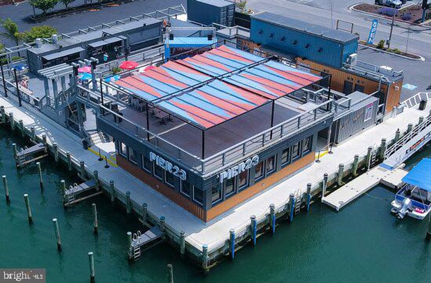 Investment opportunity located on Harbor Rd in West Ocean City. Four parcels to include Pier 23 Restaurant, Apartment Building and Parking Lot directly across the street.  Unique Deepwater Marina Fronting Location w/ 11 Boat Slips. Fully Equipped Restaurant. Income from Apartment Building.