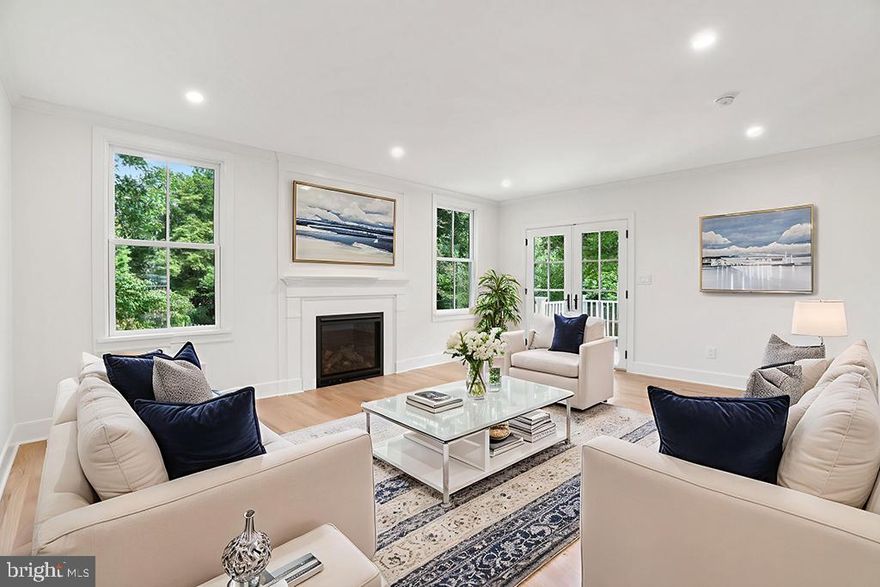 3705 Underwood Street is a stunning historic Victorian-style residence perfectly sited in the highly sought-after Village of Chevy Chase, Section 5. Nestled on a picturesque tree-lined street, this extraordinary home has been thoughtfully renovated by GTM Architects and PKK Builders, blending timeless architectural character with luxurious modern amenities. Set on a flat 6,250-square-foot lot, the property offers exceptional curb appeal with its welcoming wraparound front porch and manicured grounds.

Inside, an elegant entry foyer opens to light-filled formal living and dining rooms, showcasing gracious proportions and refined finishes. The beautifully renovated chef’s kitchen is a showstopper, featuring striking black cabinetry, a live-edge wood peninsula, premium appliances, and seamless flow to the outdoors. A side entrance leads to a thoughtfully designed mudroom, while a stylish powder room and convenient main-level laundry add to the home’s functionality. French doors open to a rear deck and a private, flat backyard—perfect for entertaining or quiet relaxation.

The upper level boasts three spacious bedrooms and two spa-inspired baths, including a luxurious primary suite with expansive closets and a serene bathroom retreat complete with a soaking tub, glass-enclosed shower, and private water closet.

With its historic charm, sophisticated renovations, and prime Chevy Chase location, 3705 Underwood Street offers a rare opportunity to enjoy the very best of modern luxury living in a classic setting and an unbeatable location close to neighborhood parks, shops, and dining.