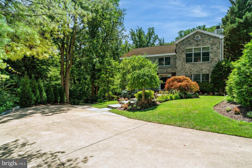 VIRTUAL TOUR AVAILABLE! One of a kind home nestled in a wooded cul-de-sac! This luxurious estate boasts a handsome stone front and extensive landscaping on one of the largest lots in N. Arlington (over 1 acre!). 3444 Roberts features breathtaking outdoor living spaces including a deck, stone patio with a firepit, waterfall, and driving range/putting green. Inside, you'll find a dramatic 2-story foyer leading to a  sun-drenched kitchen and great room (complete with stone fireplace), a formal dining room, and separate living room for all of your entertaining needs. The upper level includes a stunning master suite with an adjoining space perfect for a home office or sitting area....there are also two walk in closets! Recent updates include fresh paint throughout, new carpet, and professionally painted kitchen cabinets. The lower level has views of trees and a separate entrance. Don't miss this one-of-a-kind home located just minutes from DC...schedule a tour today!