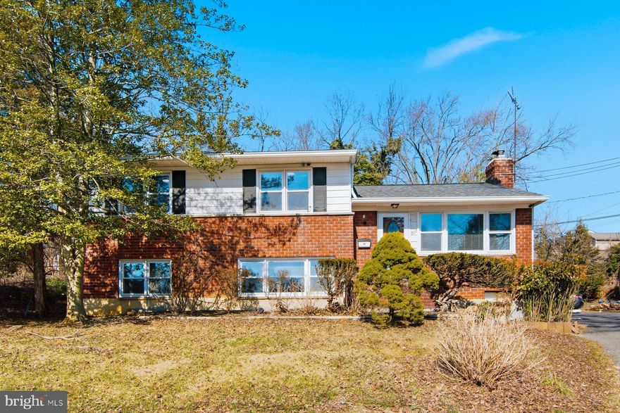 Looking for that sought-after cul-de-sac location in the Loch Raven/Towson market? Welcome home to 802 Shaw Court.

This spacious 4-bedroom, 2.5-bath split-level offers comfort, character, and a layout that truly lives well. The bright entry level welcomes you with gleaming hardwood floors, abundant natural light from a large front window, and a rich aubergine accent wall framing a black brick fireplace with a cozy pellet stove insert. Updated lighting and neutral tones create a warm, inviting space perfect for relaxing or entertaining.

Upstairs, you’ll find three bedrooms, including a primary suite with attached bath featuring a tub/shower combo. Hardwood flooring runs throughout, and a full hall bath completes the upper level.

Just a few steps down from the entry, the main level offers a spacious and versatile living area with neutral carpeting and recessed lighting. There’s plenty of room for a large sectional, full dining setup, and entertainment space, with convenient access to the kitchen. An additional bedroom on this level includes its own private access through the sunroom, ideal for guests, a home office, or multigenerational living. Another short set of steps leads to a lower bonus/utility room, offering extra flexibility and storage.

Enjoy outdoor living on the rear deck, perfect for entertaining, and take advantage of the large driveway providing ample off-street parking.

Located in the heart of Towson, this home offers easy access to shopping and dining at Towson Town Center, outdoor recreation at Loch Raven Reservoir and Cromwell Valley Park, and convenient commuter routes including Interstate 695. Tucked away on a quiet cul-de-sac, yet close to everything, this is the perfect blend of privacy and convenience.