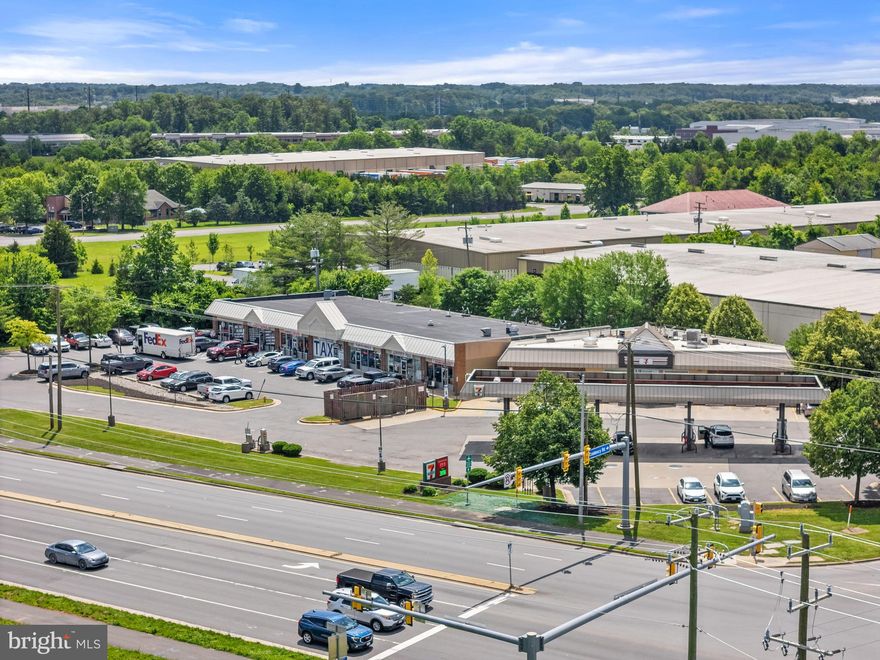 Highly traveled 7-Eleven gas station and adjoining retail space for sale at signalized intersection on US-28.  Residency Square Shopping Center sits on a 2 acre lot within sight of the Prince William Parkway, 2 Silos Brewery, Target, and McDonalds.  Fully leased retail plaza attached to 7-Eleven consists of six shops.  Building is located at the signalized intersection of US-28 and Residency Road with easy access to Prince William Parkway and I-66.