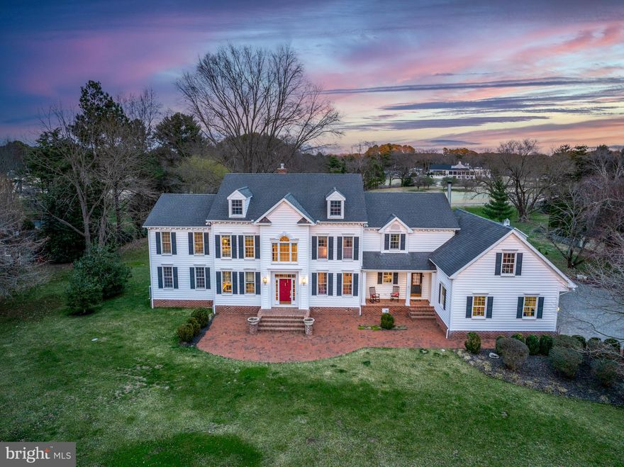 Nestled on 2+/- serene acres on the desirable Canterbury Drive off Bailey’s Neck Road , this stunning home offers an exceptional blend of space, comfort, and functionality. A welcoming foyer leads to a dedicated office space, perfect for those working from home. The bright and airy family room invites relaxation, while the spacious kitchen boasts skylights, a built-in range, and a massive island—ideal for cooking and gathering. The cozy living room, complete with a fireplace and seamless access to the back deck, provides an inviting setting for entertaining. A formal dining room adds elegance for special occasions. With 5 bedrooms there is ample space for family and guests. The primary suite is a true retreat, featuring a sitting area, an expansive walk-in closet, and a luxurious en-suite bath with a separate jetted tub and shower. Step onto the private balcony and enjoy tranquil backyard views. A whole-house Generac generator ensures uninterrupted power, providing peace of mind year-round. Outdoor living is enhanced by a brick patio, a built-in fire pit, and beautifully landscaped perennial gardens. Thoughtfully planted trees, including three bald cypress at the back of the property, provide privacy in the summer while allowing for water views in the winter. A majestic Wye oak graces the backyard, while a sycamore adds shade and character to the patio area. Adding a touch of charm and convenience, permanent outdoor lights outline the home for any holiday or added ambiance year-round. Conveniently located near Oxford, Easton, and St. Michaels, this exceptional property offers a perfect blend of space, modern upgrades, and accessibility—providing the best of Eastern Shore living.