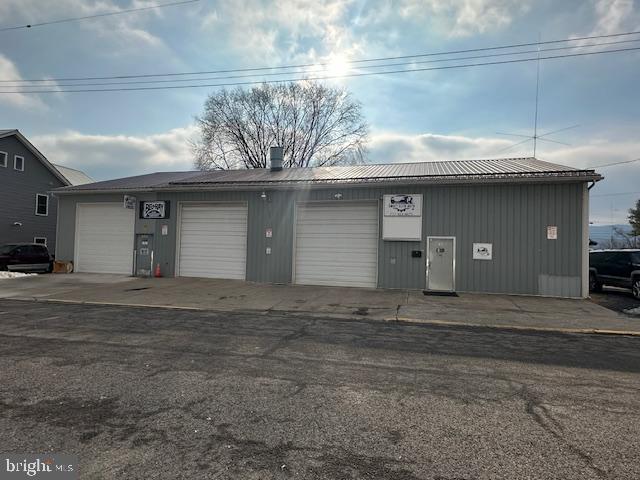 4000 Square Foot building with 3 12 ft. garage bay doors. There is a total of 155 ft. of frontage. Plenty of parking for customers or loading and unloading. There is a paint booth that was added less than 2 years ago. The additional 20 X 50 (3rd bay) was professionally built less than 2 years ago. The entrance area(waiting room) and managers/owners office areas are heated and cooled with a mini split put in less than 2 years ago and there are 2 gas heaters in the 2 main bays. There are endless options the building could be used for not limited to auto repair. Juniata St./W. 4th St. is one of the busiest streets in Mifflin County.