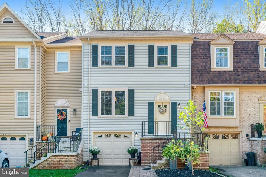 Nestled in Springfield's sought-after Daventry community, this beautifully appointed townhouse offers a perfect blend of timeless design with thoughtful upgrades, ideal for those seeking a move-in ready home. With 3 spacious bedrooms and 3 .5 bathrooms, this home is designed to cater to your every need, providing a sanctuary of tranquility and style. Step inside to discover a beautifully appointed interior showcasing architectural wood trim details and rich hardwood floors that flow seamlessly throughout the main and upper floors. The inviting dining area is perfect for hosting intimate gatherings, while the gourmet-style kitchen, complete with cherry cabinets, granite countertops, stainless steel appliances, custom wood shutters, a pantry and center island, invites culinary creativity. For convenience, a powder room is located directly off the foyer. The living space is extended to a spacious deck with a built-in gas line for effortless grilling, a staircase takes you down to a hardscaped, fenced-in private patio. The primary suite is a true retreat, the bathroom boasts heated tiled floor and a luxurious soaking tub with a separate shower, both surrounded by elegant stone. All complemented by a generous walk-in closet with custom built-ins. The fully finished lower level with a convenient rear entrance and walkout level, offers additional living space that can be tailored to your lifestyle - whether it be a cozy family room, a home office, or a recreational area.  Featuring heated tile floors, a fireplace with stone hearth and an architecturally accented mantle, and a spa-inspired marble tiled bathroom with heated shower seat, makes this the perfect spot to unwind after a long day. Outside, the property features extensive hardscaping and beautifully landscaped grounds that create a serene outdoor oasis. Enjoy the fresh air on your private deck or patio, perfect for morning coffee or evening gatherings. The home backs onto open common areas and parkland, providing a picturesque view of lush gardens and trees, enhancing your connection to nature. The community amenities are truly exceptional, including a sparkling outdoor pool, tennis courts, and a recreational center, ensuring that leisure and recreation are just steps away. With 312 acress of well-maintained landscaped common areas and walking paths, the neighborhood encourages an active lifestyle, whether you prefer biking, jogging, or simply enjoying a leisurely stroll. Daventry offers exceptional amenities including a community center for private events, a pool, tennis/pickleball courts, and 5 playgrounds, all just steps from miles of scenic CCT walking and biking trails. The neighborhood provides easy access to bus lines and is only minutes from major commuter routes, Metro, shopping, dining, and top-rated schools. Conveniently located near public transportation options, including bus stops and metro stations, this home offers easy access to the surrounding area while maintaining a peaceful retreat. An attached garage and off-street parking provide added convenience for you and your guests. This property is not just a house; it's a lifestyle. Experience the perfect blend of convenience, comfort, and community in this stunning Hunter Village townhouse, where every detail has been thoughtfully designed to create a warm and inviting home.