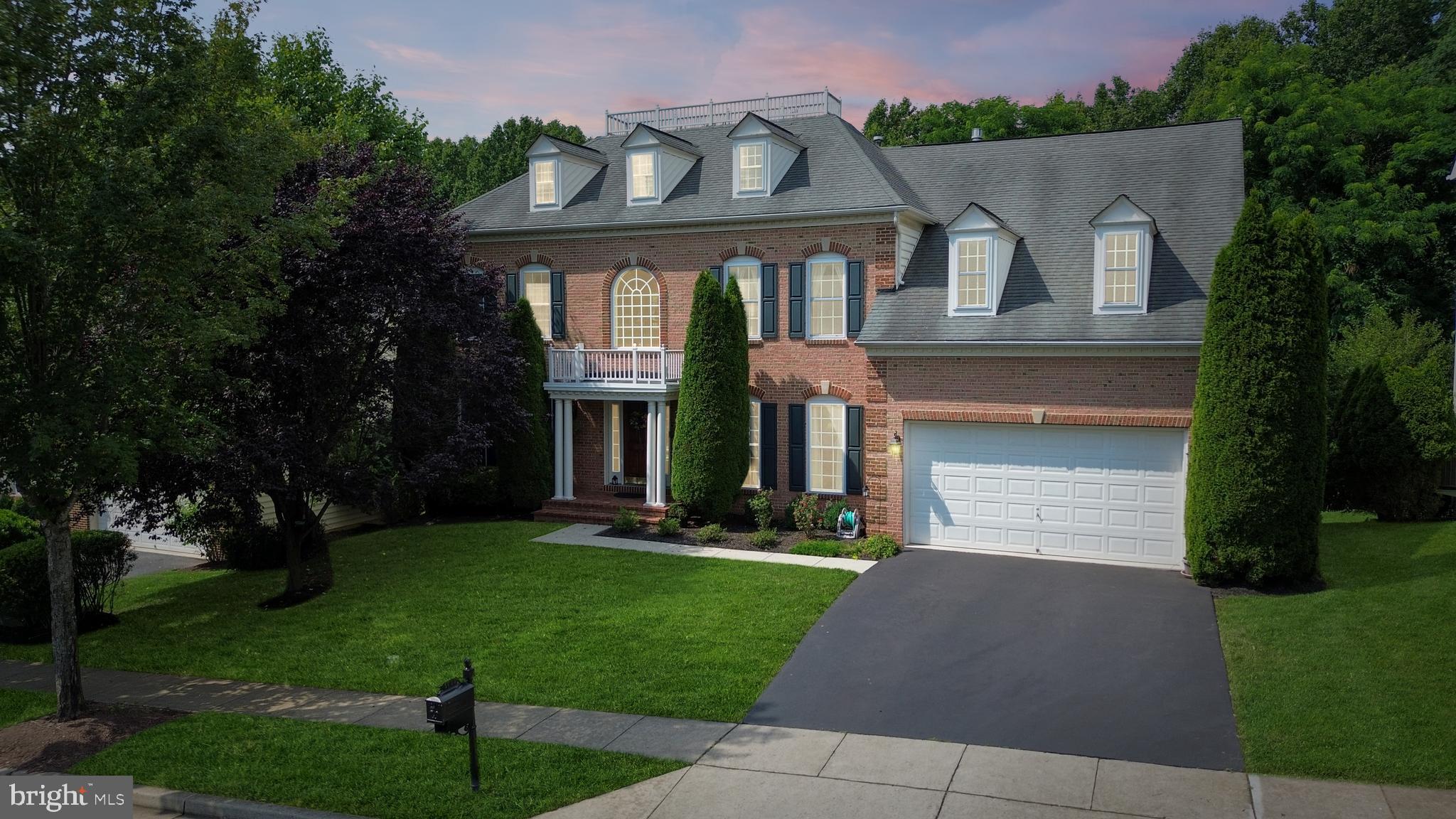 Welcome to your dream home on a great tree-lined flat lot in the Villages of Urbana! This is a rare opportunity to own a highly sought-after NV Potomac model upgraded with a morning room and family room bump out! This spacious home offers a well-designed a floorplan that includes a formal living room, formal dining room, and a convenient office. The family room, complete with a cozy gas fireplace, opens to an expansive kitchen with an upgraded light-filled morning room bump-out – perfect for enjoying meals and entertaining guests. The kitchen is a gourmet chef’s dream with a large granite island, plenty of cabinetry, stainless steel appliances and a double oven. From the morning room, step out to the spacious low low-maintenance deck. This level also includes a half bath and laundry room leading to the two-car garage. Upstairs, you'll find four generously sized bedrooms and three full bathrooms, including a luxurious primary suite with a separate sitting area with a two-sided gas fireplace, elegant tray ceiling, and walk-in closet. The spa-like primary bath features dual sinks, a separate soaking tub and shower. The walk-out lower level provides plenty of space for storage and is waiting for you to put your own finishing touches on it. Step outside to the flat backyard that backs to woods, perfect for outdoor activities. Don't miss your opportunity to live in the Villages of Urbana--with its sought-after amenities, including three resort-style pools, neighborhood fitness centers, clubhouses, tennis, basketball and pickleball courts, walking trails, plenty of HOA-run events, and much more! Situated in a great commuter location, this home also provides access to all that Urbana has to offer including the YMCA, library, grocery store, shops, restaurants and community parks.