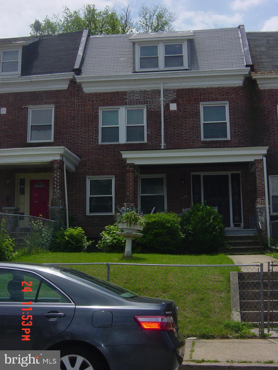 4 level brick town home with 6 bedrooms and 3 full baths. Interior unit with covered front porch. Beautiful hardwood floors. Kitchen has breakfast bar and all appliances. Ceiling fans and window a/c units. Rear balcony. Fenced rear yard and porch. Partially finished lower level. Decorative fireplace in living room. Dual pane windows. Detached 2 car garage with workshop. SentriLock on front door. Do not need appointment confirmation. Knock and announce yourself on each floor.