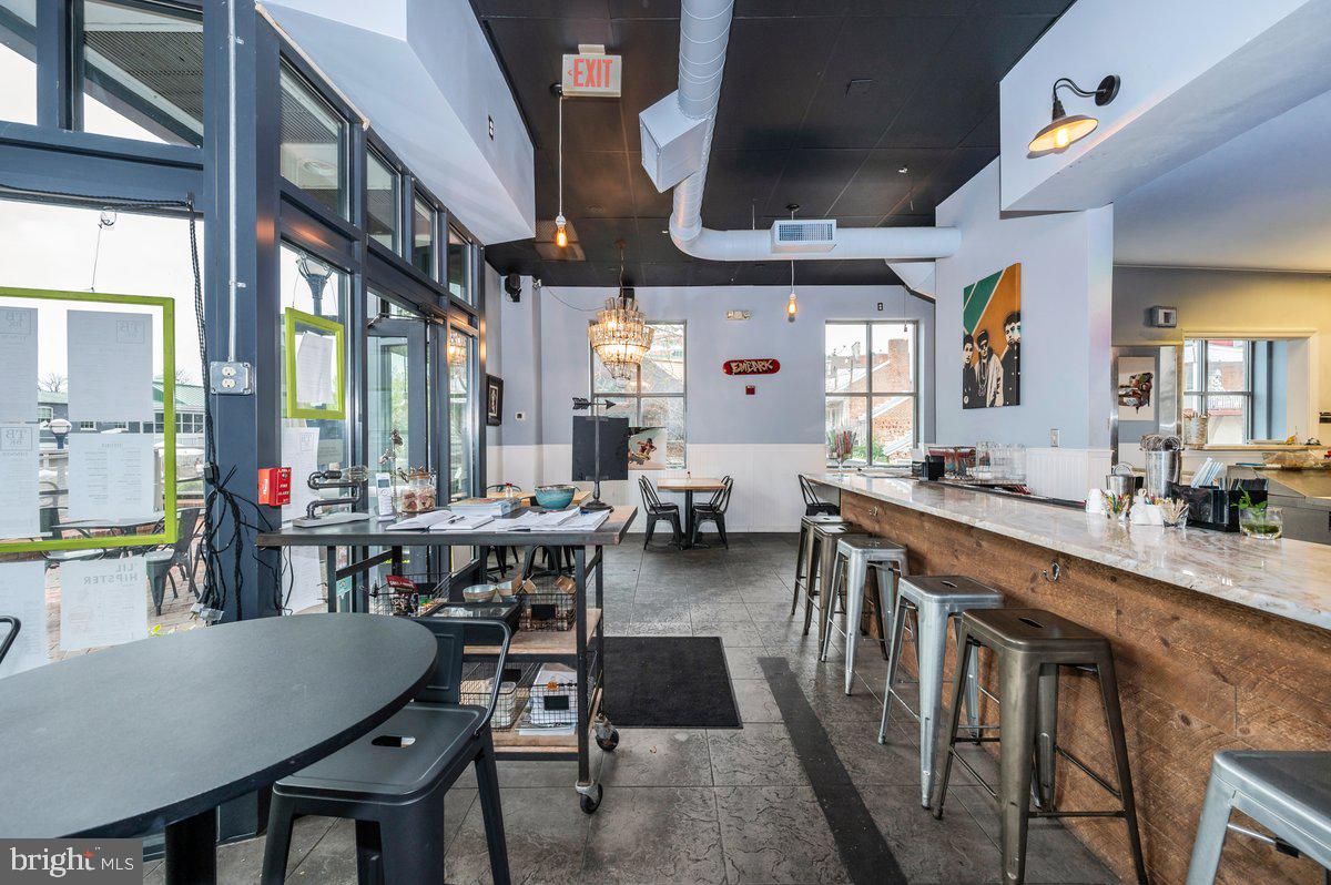 Picture this: your restaurant, right in the heart of vibrant Downtown Frederick, nestled in a Class A building where foot traffic never stops. This turn-key space is ready for your culinary vision—no waiting, just bring your dream to life! Positioned along the bustling Carroll Creek Promenade, this location serves as the epicenter for Frederick’s biggest events—*First Saturdays*, *In The Streets Festival*, *Alive @ Five*, *Fourth of July fireworks*, *Sailing Through the Winter Solstice boat displays*, and countless art walks, wine strolls, and foodie events. Every season brings new energy, and your restaurant can be at the center of it all.
Your future guests will enjoy not just incredible food but the charm of historic streets, boutique shopping, art galleries, cozy coffee shops, and award-winning breweries all just steps away. With proximity to parking garages, high-end residential spaces, and thriving businesses, this spot offers unmatched visibility and walkability.
Don’t just open a restaurant—become part of Downtown Frederick’s heartbeat. Schedule your tour today and claim your space at the center of it all!