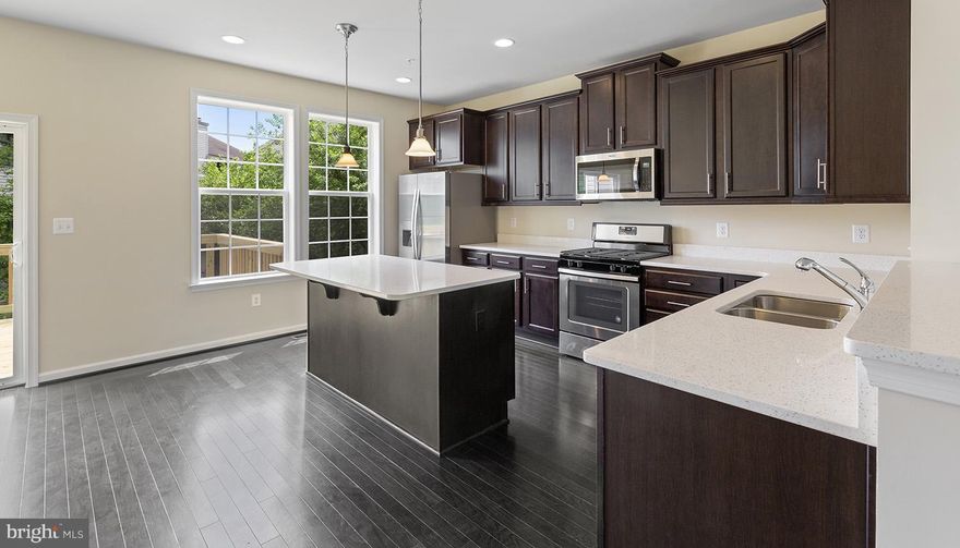 The stunning 1-car garage townhome offers 3 levels of luxury living space. The generous 9 ft ceilings will provide an open and airy feel. Inside you will be greeted by a gourmet kitchen SS appliances, granite countertops and an abundance of natural light. Retreat to your owners suite featuring plush carpeting, dual vanities, walk-shower w/recessed lighting. * actual home may differ from photos* Available for summer move in. Schedule your personalized tour today!