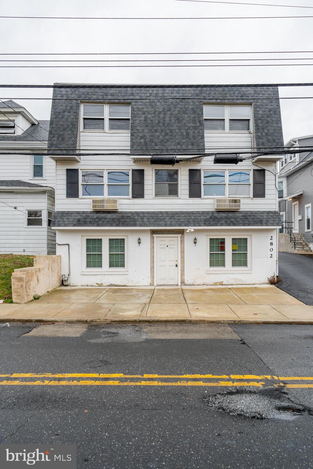 Welcome to this cash-flowing 5-unit building! It has four 1 bedroom units and a 2 bedroom unit. 4 of the 5 units are currently rented. A shared driveway leads to a parking area behind the building that can park 7 cars. The landlord pays for water and sewer, and the tenants pay for all other utilites. This unit can be packaged with 2807 and 2800 for a total of 11 units plus an additional parcel has a rental garage, or it could be purchased separately. The financial spreadsheet and package pricing is available upon request. Showings will be by open house only, Sat, March 1st from 1 to 3 PM.