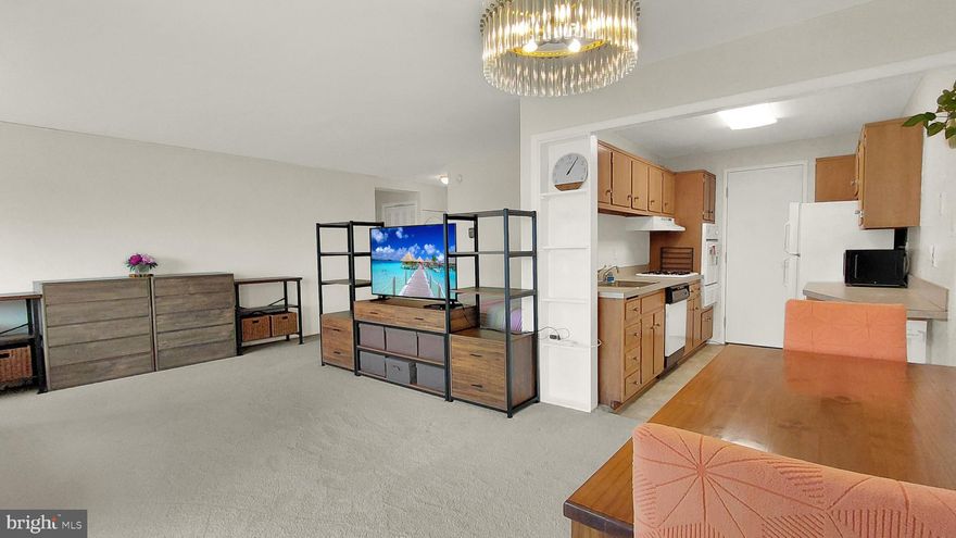 Fabulous opportunity!  Furnished, move-in ready with Balcony and deeded Garage Space.  14th Floor View to Southeast.  Nearly 600 square feet of living space in Grosvenor Park - the jewel of Montgomery County.  Floor plan includes Galley Kitchen with service entrance and gas cooking, large living area, separate dining area with balcony access, plus coat, linen and large walk-in utility closets.  Close to Grosvenor Metro Station, Strathmore Arts Center, Walter Reed Medical Center, NIH, and all major shopping, restaurants and with routes to Bethesda, DC, VA, Frederick, Baltimore & Annapolis. Onsite award-winning Grosvenor Market, dry clean valet, hair dresser, party rooms, fitness center, community laundry, pool, picnic area, rooftop terrace, tot lot, bike and extra storage, 24/7 concierge and onsite security. Fios & Xfinity available in unit.  Free wifi in common areas.   Ample free parking outside for guests.   NO DOGS, but cats, birds and other small caged pets welcome!  SMOKE FREE.  Hallway renovation project almost finished!
