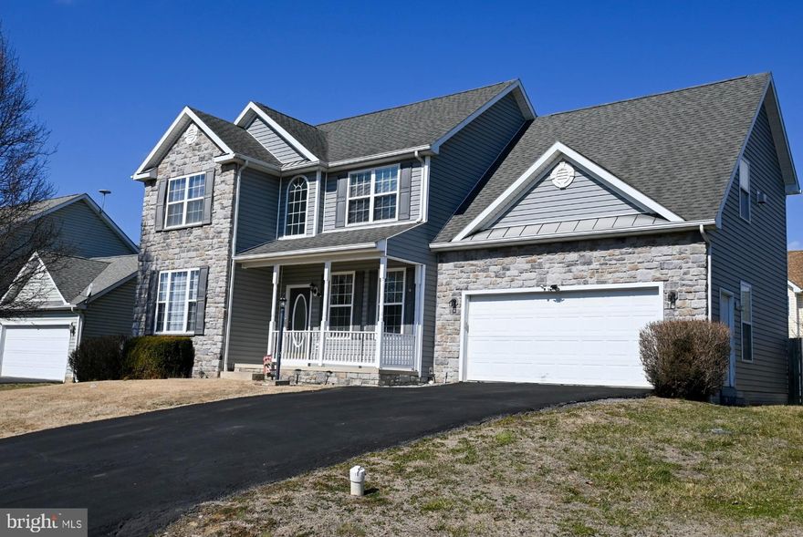 This stunning Colonial-style home in the Crestfield subdivision offers a perfect blend of comfort and convenience. Built in 2003, this detached residence features a durable stone and vinyl siding exterior, ensuring both aesthetic appeal and low maintenance. With 3,254 finished square feet, the layout includes 4 spacious bedrooms and 3.5 bathrooms, providing ample space for relaxation and entertainment. The fully finished basement adds versatility, perfect for a home theater or play area. The upper-floor laundry adds convenience to daily routines. The kitchen is equipped with modern appliances, including an electric oven/range, dishwasher, garbage disposal, refrigerator, plus an extra refrigerator/freezer in the garage, making meal prep a breeze. The exterior boasts a play area with equipment, ideal for outdoor fun. The attached garage accommodates two vehicles, with additional driveway space available. Crestfield is known for its welcoming community atmosphere, with nearby parks and recreational facilities that promote an active lifestyle. Residents benefit from access to quality schools and essential public services, enhancing the overall living experience. This property is conveniently located just minutes off I81. New heating and air systems  installed in July 2025. Don't miss the opportunity to make this exceptional residence your own!