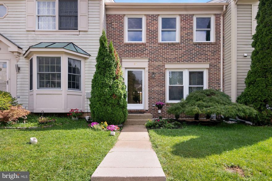 Rarely Available - meticulously maintained and in PRISTEEN CONDITION - 3 level Townhome w/ 2 incredibly sized Bedrooms, each with its own EnSuite Bath and fantastic natural light!  The entrance brings you into the handsomely updated eat-in Kitchen featuring granite counters,  brand new  electric range and large prep peninsula.  Other fantastic features include a NEW ROOF (10/2018), new air conditioning compressor, attractive hardwood floors throughout the Dining and spacious Living Areas, , and brand new carpet on both staircases. The finished Lower Level boasts a well-proportioned Family Room w/ a marble-surround wood burning fireplace (only a few homes in the neighborhood have one!), rough-in for Full Bath and glass atrium doors leading to the rear patio and fenced rear yard w/ lovely gardens/plantings! Large freshly-painted deck off of the Living Room. Uniquely situated within the community so that your view from the back deck, patio & windows do NOT look at another residence! You are able to observe the sunrise from the front rooms and watch the sunsets while relaxing on the rear deck & patio! Plenty of open parking. What a jewel!