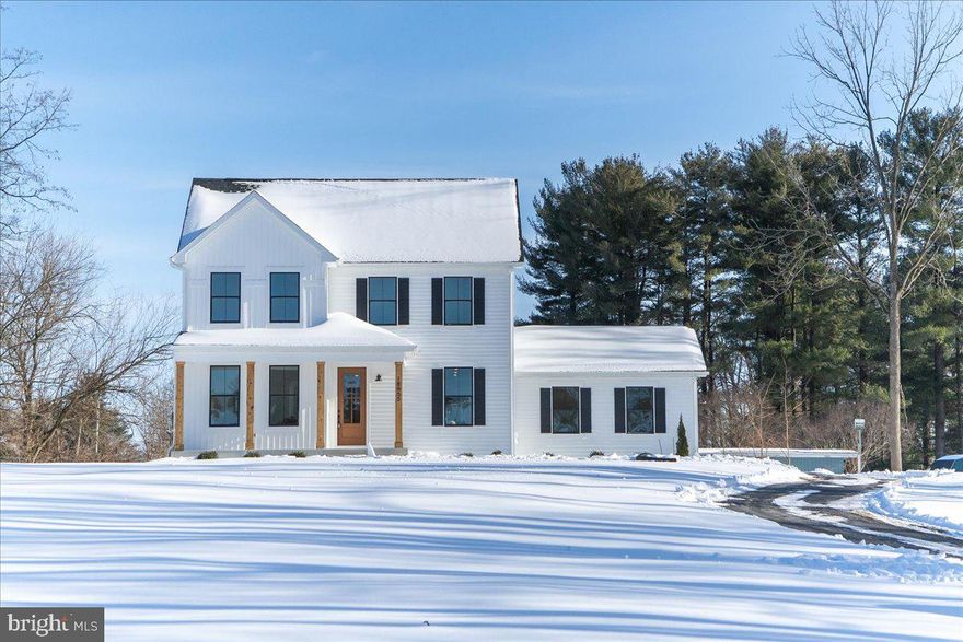 Property will be Active and ready for showings on Friday, February 6. Public Open House Sunday 2/8 from 11am-3pm.  ****BRAND NEW & READY FOR IMMEDIATE OCCUPANCY**** this modern farmhouse by Laine Street Homes features 5 bedrooms 3.5 bathrooms, and over 3,000 well appointed finished square feet. Set atop a 1.39 acre homesite with pastoral views, this property offers both privacy and functionality. From the welcoming front porch, step into a thoughtfully designed main level which features a private office, formal dining room and a spacious family room highlighted by large picture windows and a modern gas fireplace. At the heart of the home, the gourmet kitchen impresses with premium quartz countertops, herringbone tile backsplash, tasteful high-end timber and graphite black cabinetry w/dovetail joints and soft-close drawers, a spacious pantry, farmhouse apron sink, stainless steel appliances and a large island with breakfast bar. Upstairs enjoy 4 bedrooms and 2 full bathrooms, including a primary suite boasting luxury vinyl plank flooring, a walk-in closet, and a spa-inspired ensuite bath with a 7x6 walk-in shower with dual shower heads and floor-to-ceiling tile. The finished lower level offers a 9ft ceilings, a spacious recreational room, fifth bedroom and a third full bath. Additional highlights include 7-inch LVP flooring throughout the main level, cedar wrapped front columns, 2x6 construction, custom trim detail, a 92% efficient HVAC system, 30-year architectural shingles and much more. With no HOA or restrictive covenants, this home offers rare flexibility and freedom in a highly desirable location within the Hereford zone, and convenient to major commuter routes I-83 and I-695. This property will not last long, schedule your private tour today!