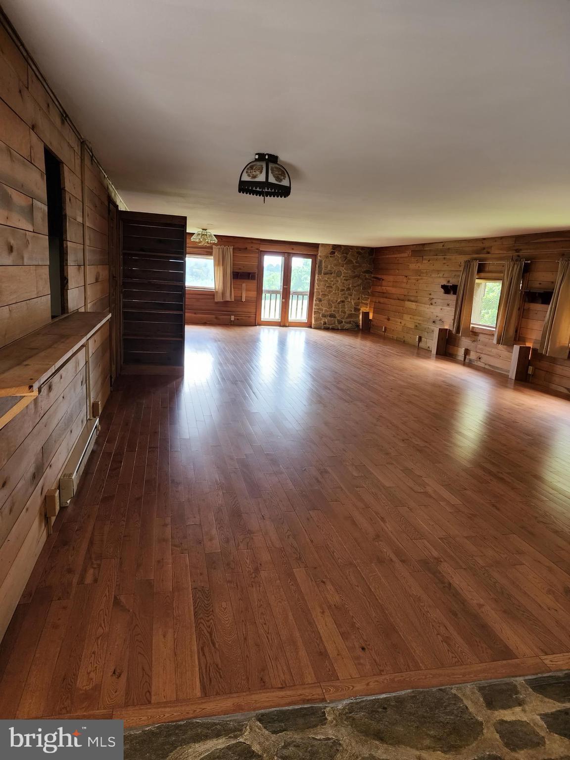 Charming 1-Bedroom Loft Above Horse Barn – Peaceful Country Living Close to Town Escape the hustle and bustle in this unique and spacious 1-bedroom, 1-bath loft located above a horse barn. Enjoy the rustic charm and privacy of country living while still being just a short drive from shopping, restaurants, and other conveniences. This unit features a huge living room, large walk-in closet, and a spacious bathroom for ultimate comfort. Stay cozy in the winter with a pellet stove, and enjoy the welcoming ambiance of stone flooring in the foyer.