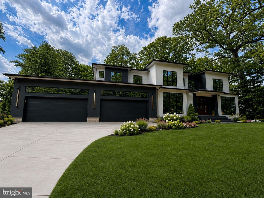 Welcome to 2537 Gallows Rd — where bold modern design meets one of Northern Virginia’s most connected and sought-after locations,  >9 minute walk to Dun Loring metro, >9 min drive to Tysons >4 minutes drive to the Mosaic District and major commuter routes. A striking new construction residence offering approximately 8,360 square feet, 7 bedrooms, 6.5 bathrooms, and a 4-car garage. Thoughtfully designed with high-end finishes and a layout that truly lives well, this home delivers both luxury and functionality in one of Northern Virginia’s most connected locations.
From the moment you enter, you’re greeted by a dramatic two-story marble foyer that immediately sets the tone. Wide-plank hardwood floors carry throughout the main level, where an open, modern layout unfolds. At the heart of the home is a show-stopping chef’s kitchen, complemented by a fully equipped secondary (spice) kitchen—perfect for entertaining, catering, or everyday cooking at scale. A walk-through pantry seamlessly connects the spaces, offering both convenience and exceptional storage. The main kitchen is outfitted with Sub-Zero refrigeration, a Wolf range, sleek black countertops, glossy white cabinetry, and modern brass accents—bringing together both style and performance.
Just beyond, the home opens into a breathtaking two-story family room featuring coffered ceilings and a floor-to-ceiling fireplace that creates an unforgettable focal point, adding both scale and warmth. Off the kitchen, a sun-drenched breakfast area is surrounded by windows, filling the space with natural light and creating the perfect everyday gathering spot.
A private main-level bedroom with a full bath offers flexibility for guests or multigenerational living, while access to the Trex deck allows for easy indoor-outdoor entertaining.
Upstairs, the primary suite is a true retreat, complete with a private tiled balcony, a sitting area with its own fireplace, and a luxurious marble bathroom designed for relaxation. Three additional bedrooms each feature en-suite baths and custom walk-in closets, with two bedrooms sharing access to a private balcony—ideal for quiet moments and fresh air.
The walkout lower level is a standout feature, filled with natural light from oversized windows that make it feel bright and inviting throughout. This level offers incredible versatility with space for a gym, theatre, and additional living areas, along with a bedroom and full bath. A wet bar with an island anchors the space, making it perfect for entertaining. Step outside to a backyard ready to be transformed into your own private retreat, with endless possibilities for custom hardscaping and outdoor living.
Throughout the home, elevated details continue to impress, including floating stairs with integrated lighting, smart toilets, body jets in every shower, and sleek aluminum windows that enhance the home’s modern aesthetic and its complete with an elevator shaft fully equipped for every level. 
Ideally positioned just minutes from Tysons Corner, Walking distance to Dun Loring Metro, Tysons Galleria, the Mosaic District, and major commuter routes including I-66 and I-495, this location offers unmatched convenience for shopping, dining, and everyday travel and an active lifestyle positioned directly across from the W&OD Trail and park, offering immediate access to miles of scenic walking, running, and biking paths—making it an exceptional choice for those who value both luxury living and accessibility.
A rare opportunity to own a custom-built home that seamlessly blends bold design, modern elegance, and a location that keeps you close to everything.