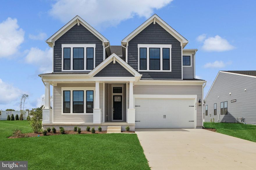 The Tuscaloosa home offers a thoughtfully designed layout with elevated finishes throughout, with a projected settlement of April 2026. Featuring 2 bedrooms, 2.5 baths, and a 3-car garage, this home blends everyday functionality with timeless style.

Standout features include a dedicated home office, a screened patio perfect for outdoor relaxation, and a shiplap-accented fireplace paired with ceiling beams that add warmth and architectural character to the great room.

The kitchen is well-appointed with a single oven, microwave, gas cooktop, range hood, dishwasher, French door refrigerator, pendant lighting, and a tile backsplash, all finished with Quartz countertops that continue into the owner’s bath for a cohesive, upscale look.

Luxury Vinyl Plank flooring flows through the foyer, extended foyer, kitchen, dining area, great room, HovHall, owner’s suite, and extra suite, while tile enhances all full baths. Carpeted secondary spaces provide comfort in additional bedrooms and the loft. The owner’s bath features a shower with seat, handheld shower wand, and double sinks, creating a relaxing retreat.

For a full list of included features, please contact our sales representatives.
Photos are for illustrative purposes only and may not represent the exact home or finishes available.

Welcome to a new luxury active adult 55+ community on Maryland's Chesapeake Bay. Discover the amenity-filled, resort-style experience within 45 miles of Washington DC and Baltimore. Residents can take advantage of the community's 24,000 sq. ft. clubhouse with indoor & outdoor pools, a state-of-the-art fitness center, and multiple tennis and pickleball courts. With a full-time lifestyle director on site the community also features a well-maintained calendar of activities such as walking club, indoor and outdoor yoga sessions, mahjong club, kayaking, pickleball and more. Kent Island life is about making friends and enjoying the company of people who have worked hard and now want to enjoy all that a luxury 55+ community has to offer. Located steps from the water and minutes from Annapolis, the location also offers quick access to Rt. 50. Enjoy the convenience of nearby dining and shopping options together with the quaint charm of a small town.