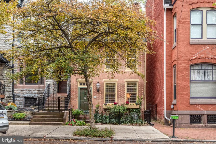 Lovely Brick Colonial Just Steps from Penn Square and Central Market

Positioned in the desirable Musser Park neighborhood, this lovely brick colonial offers the perfect blend of historic charm and modern updates. Only 3 blocks from Penn Square and Central Market, enjoy convenient city living with a welcoming, garden-lined retreat with off-street parking. 

A wrought iron fence frames the front entrance, providing both privacy and curb appeal, while a breezeway aside leads to the backyard garden with paver patio and parking area. Inside, hardwood floors and exposed wood beams set a warm tone.  The living and dining areas are complemented by a modern kitchen featuring stainless steel appliances, granite counters, a breakfast bar and a pantry.   A true gem with a City rarity: a wood-burning fireplace in the living room.  The convenient powder room is highlighted by a copper vessel sink on a granite counter.

The main level flows seamlessly for entertaining, while the second floor offers 2 bedrooms, a full bath between them and a convenient laundry.  The third floor presents a versatile bedroom or office with its own half bath.  

Outside enjoy lush gardens filled with perennials, hostas, tons of tulips, mature Locust tree and window flower boxes.  Enjoy a serene retreat with a shaded backyard complete with paver patio (2021) perfect for relaxing or entertaining.  Additional features include two easements on adjoining properties that provide both a breezeway from sidewalk to the backyard and a driveway to the parking pad behind the house (2 car).  With a basement for storage, well-maintained interiors and blinds/shades throughout for privacy, this beautiful home is move-in ready. 

This home is a rare opportunity to enjoy city convenience, historic character and beautiful outdoor spaces all in one much-desired location.  Relax knowing the home’s premium systems have been carefully maintained or replaced: electric service box (200 amp) with surge protection; new HVAC (both furnace and AC); newer water heater and more - see list of improvements, inclusions, virtual tour video.  Don’t miss the opportunity to make this beloved city home yours for the winter holidays!