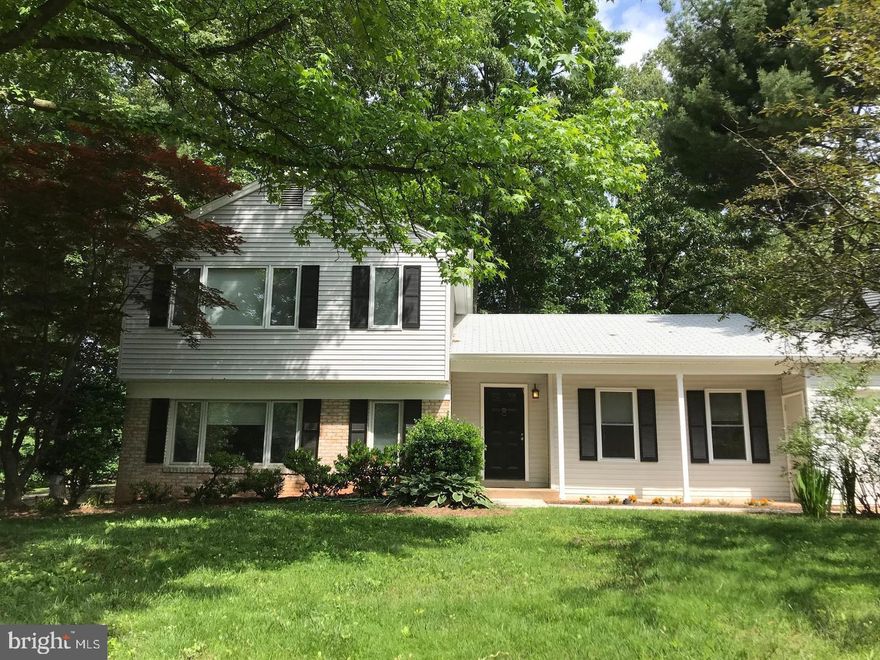 Here’s high styled luxury for the family that entertains! This newly remodeled home is surrounded by stunning landscaping.  The large open floor plan has hardwood floors on the main levels.  There are stainless steel appliances.  A nine foot long island with a huge farm sink and a designer black faucet.  The contemporary design adds black accents on wood cabinets and light fixtures. The attached living and dining areas span the entire width of the home and light streams from front and back.

The enormous family room has a wood burning fireplace and a nearby powder room.  The sliding glass door leads to a large flagstone patio where you can barbecue for a crowd.  An impressive stone bridge leads to a second patio that’s secluded among mature trees.

The lowest level of the house could be a game room, office or large theater.

All bedrooms have upgraded carpet.  Large master with an ensuite bath.   Two other bedrooms share a full bath.  Both bathrooms were recently remodeled.

The yard is large, flat and great for running and playing. Sidewalks throughout the neighborhood. 

Homeowner will pay HOA fees. Photos were taken when house was vacant.