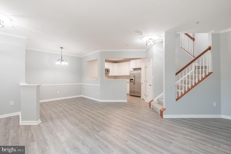 Beautifully updated 3 bedroom 2.5 bath townhome in Taskers Chance. Walk into a light and bright main floor with new floors flowing through out. The open concept is perfect for entertaining and includes dining nook with chair railing and crown molding. The kitchen provides plenty of counter space, beautiful white cabinets and stainless steel appliances including French door refrigerator with ice maker. The second level includes 2 bedrooms with plush carpeting and closets along with laundry room and full bath with bathtub. The third level is the spacious primary suite with plush carpeting and walk in closet. The en-suite includes dual vanities, soaking tub and stall shower. The community offers walking paths, a tot lot and an outdoor swimming pool. Close to commuter routes, shopping, grocery stores and downtown Frederick. You do not want to miss this one!