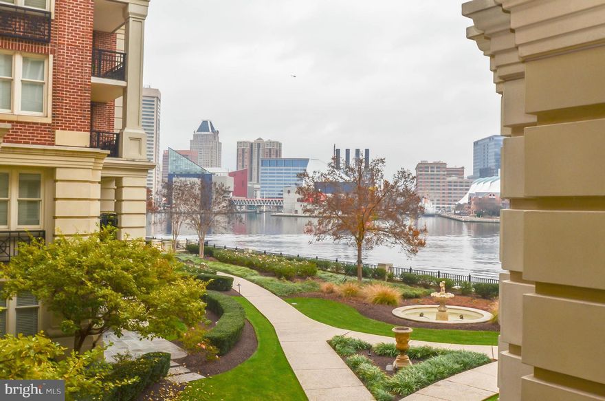 Enjoy the Ritz lifestyle! Rare opportunity to purchase over 2500 square foot, 2 bedroom and den with water views and 2 balconies at this price.  Wood floors throughout most of unit.  Elegant custom kitchen, built-ins, millwork and coffered ceiling.Includes.Condo fee includes gas, heat, hot water and cable.Pool, exercise, lounge, theater and billiards rooms.2 deeded garage spaces.Shows beautifully.