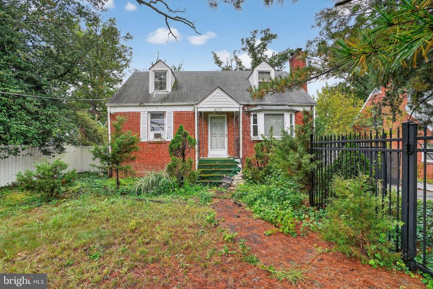 Charming brick home with spacious yard and potential in District Heights! 
This classic brick home on Forestville Road offers 3 bedrooms and 1 bath, presenting a solid foundation with room to personalize. The living room features a fireplace that serves as the centerpiece of the main level. A partially finished basement provides flexibility for storage, recreation, or future expansion. The home requires updates, giving new owners the opportunity to design it to their taste and needs.
The lot enhances the property’s appeal with a wide backyard ideal for gatherings, gardening, or outdoor play, paired with a front yard that frames the home. Its location has quick access to local parks, shops, and commuter routes, making daily living practical and connected. 
With strong bones, outdoor space, and classic charm, this home is ready for someone to bring fresh vision and updates.