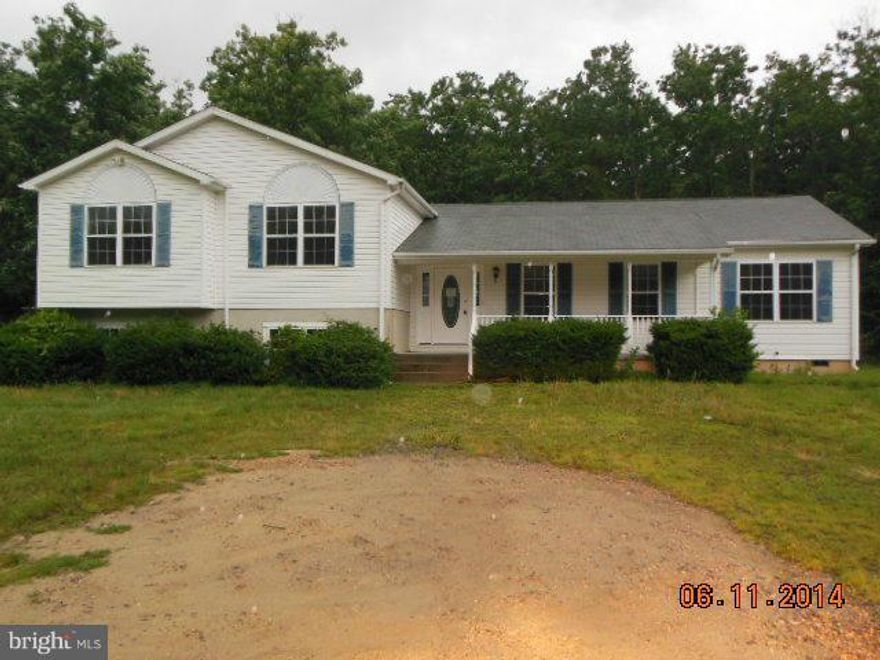 4 bedroom 2.5 bath home on almost 3 acres with no HOA! Lots of space to stretch your legs or relax on the country front porch! This home is part of the Freddie Mac First Look Initiative - only owner-occupants or second-home buyers will be considered through 7/1/2014.